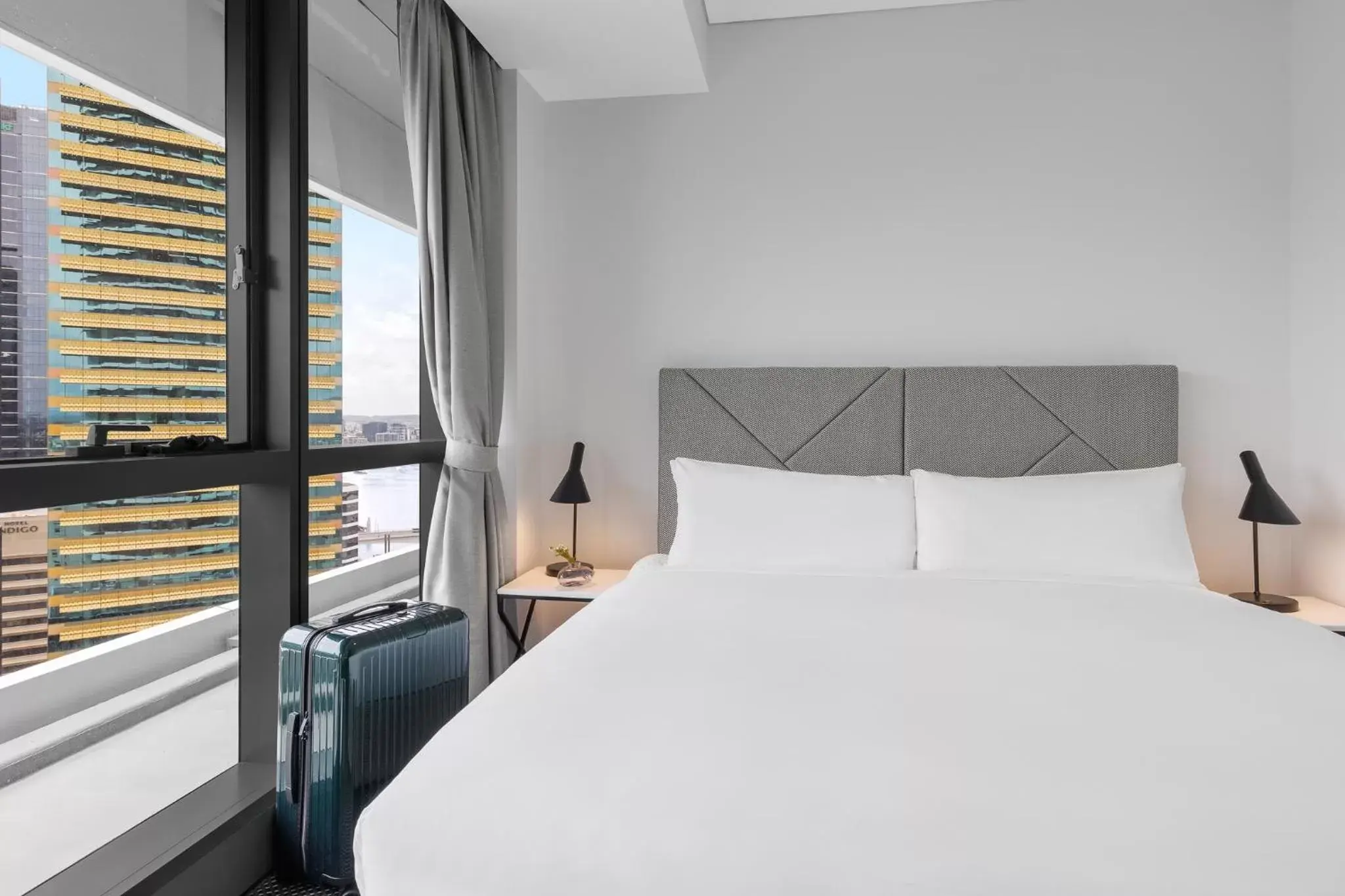 Bed in Meriton Suites Herschel Street, Brisbane