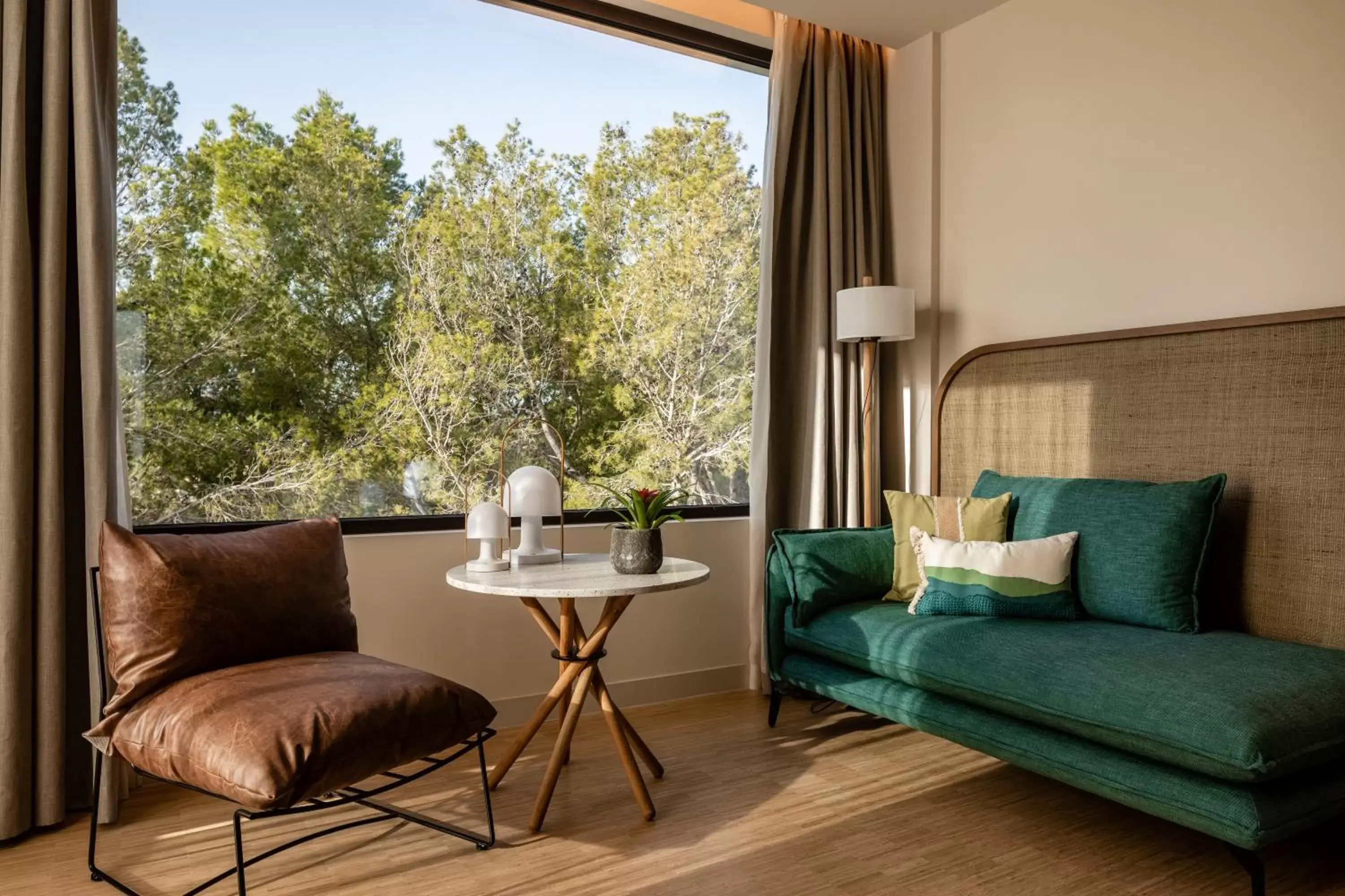 Bedroom, Seating Area in Kimpton Aysla Mallorca, an IHG Hotel