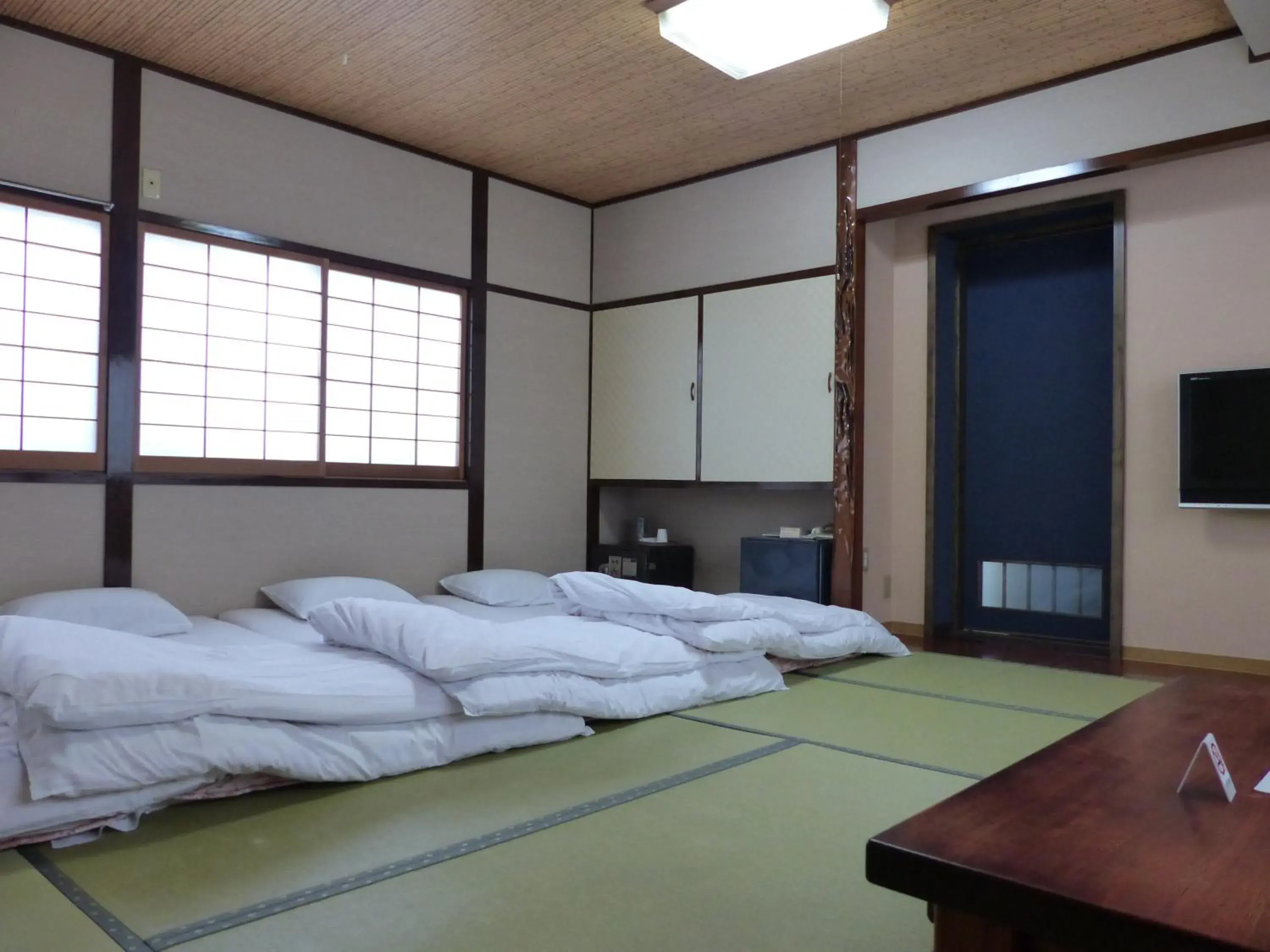 Bed in Minshuku Kuwataniya Ryokan