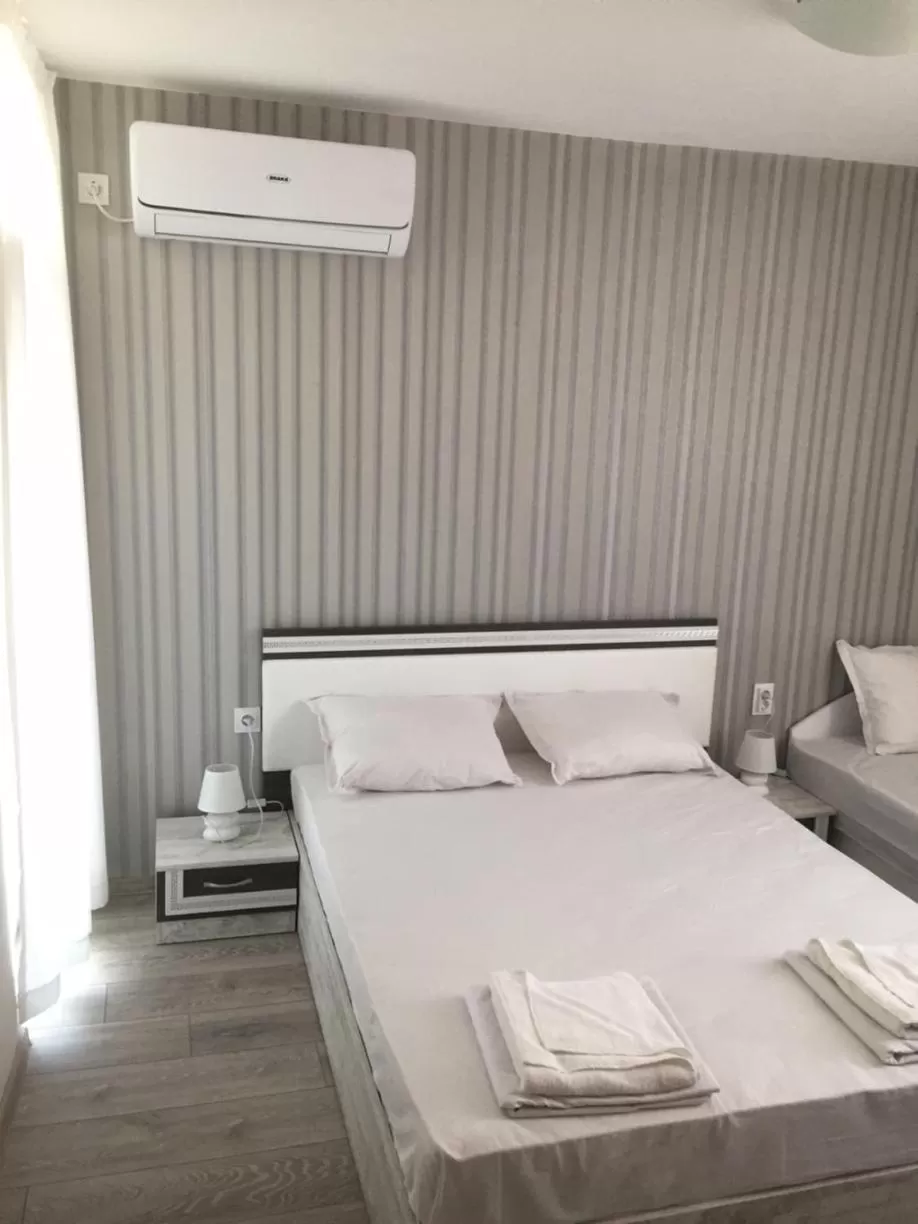 Bed in Family Hotel Malibu