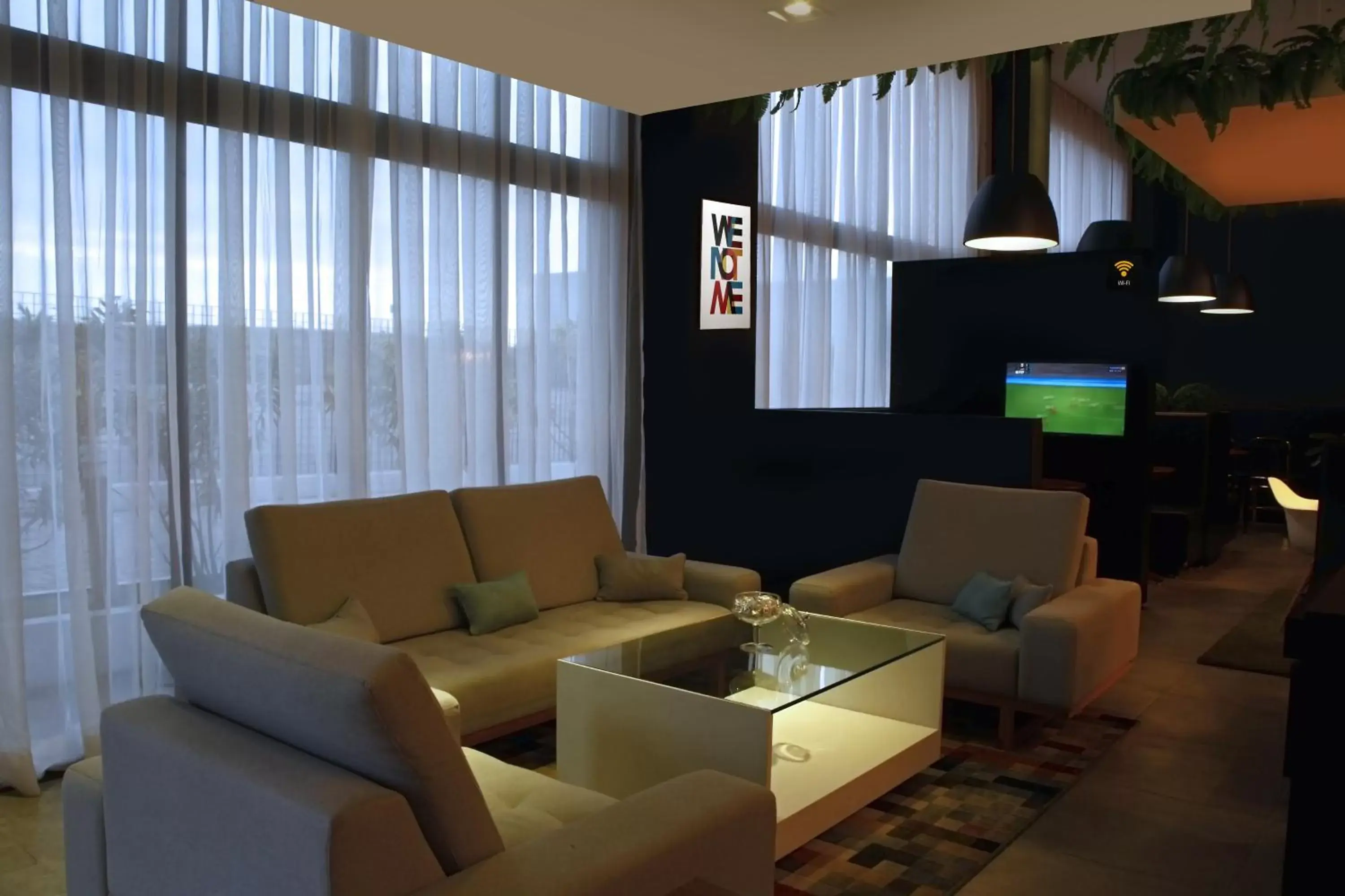 Communal lounge/ TV room, Seating Area in ibis Styles Palmas