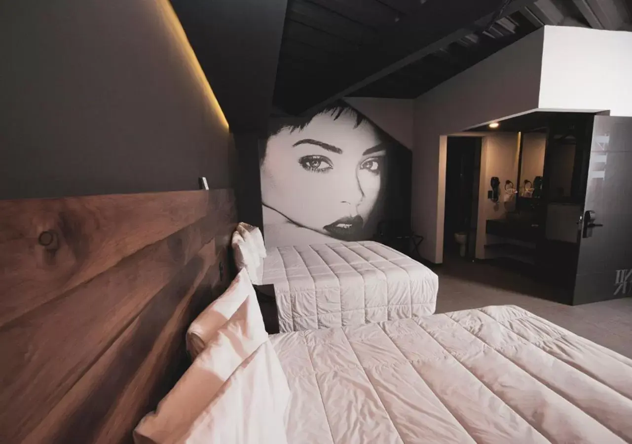 Bed in HOTEL RIO RITA Bed in HOTEL RIO RITA