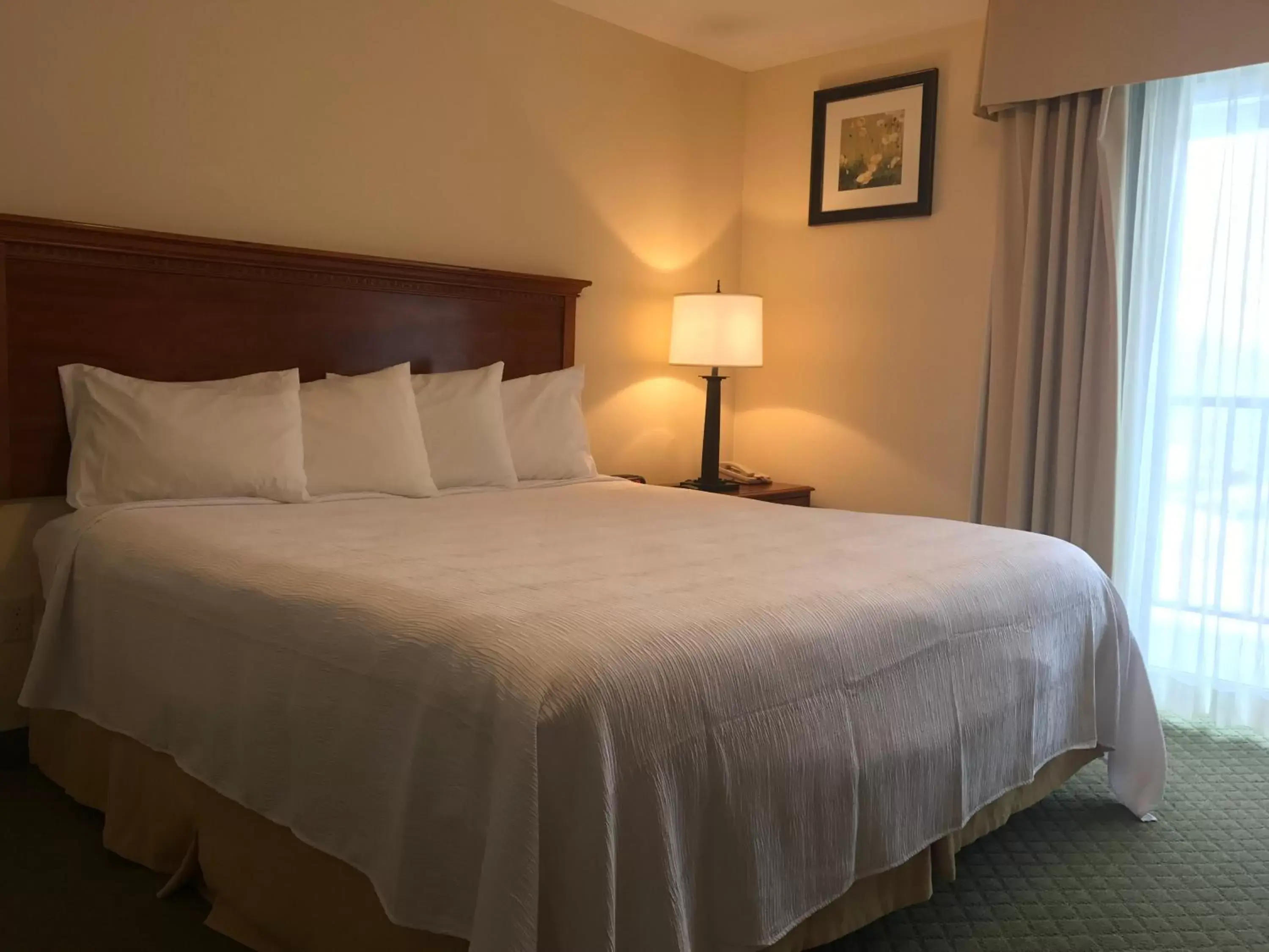 Bed in White River Inn & Suites