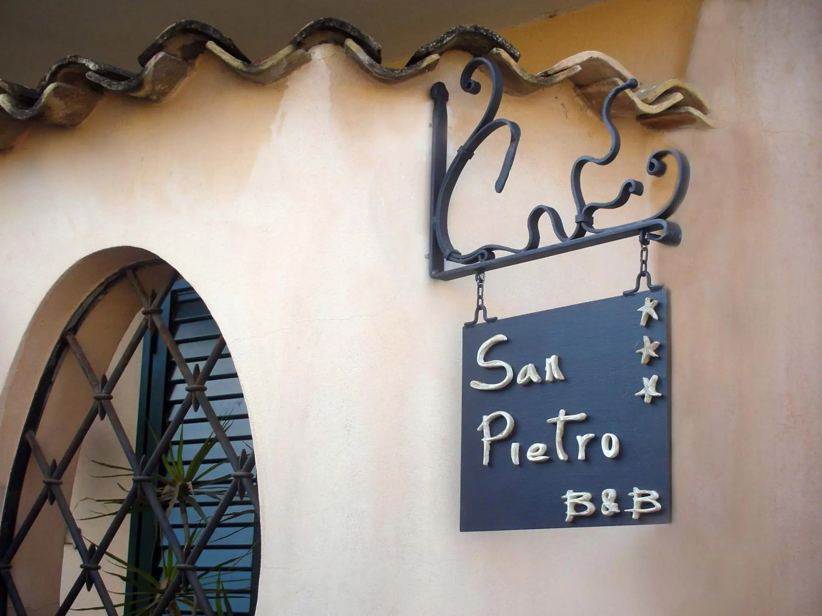 Property logo or sign in San Pietro