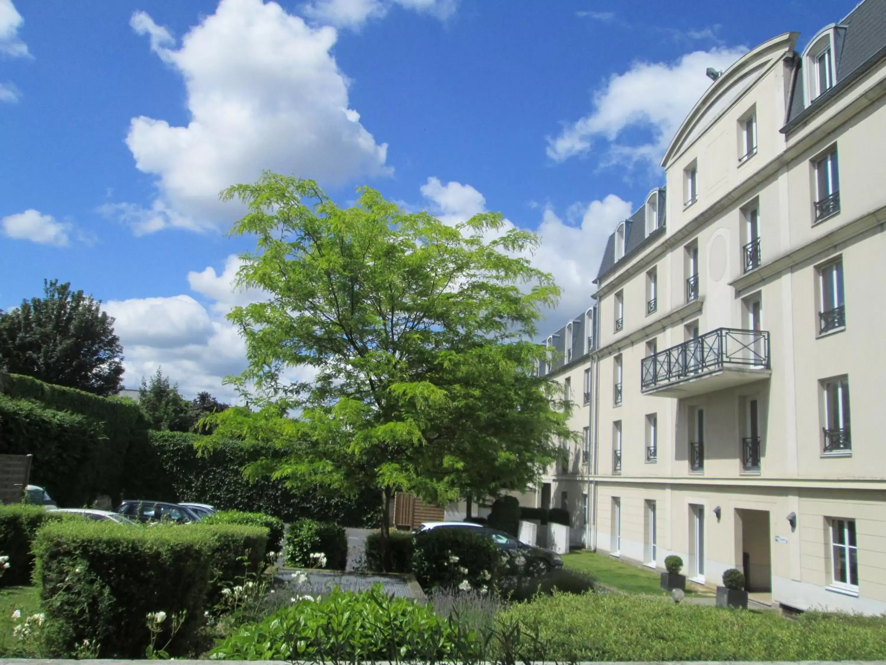 Garden view, Property Building in Hôtel Baudouin