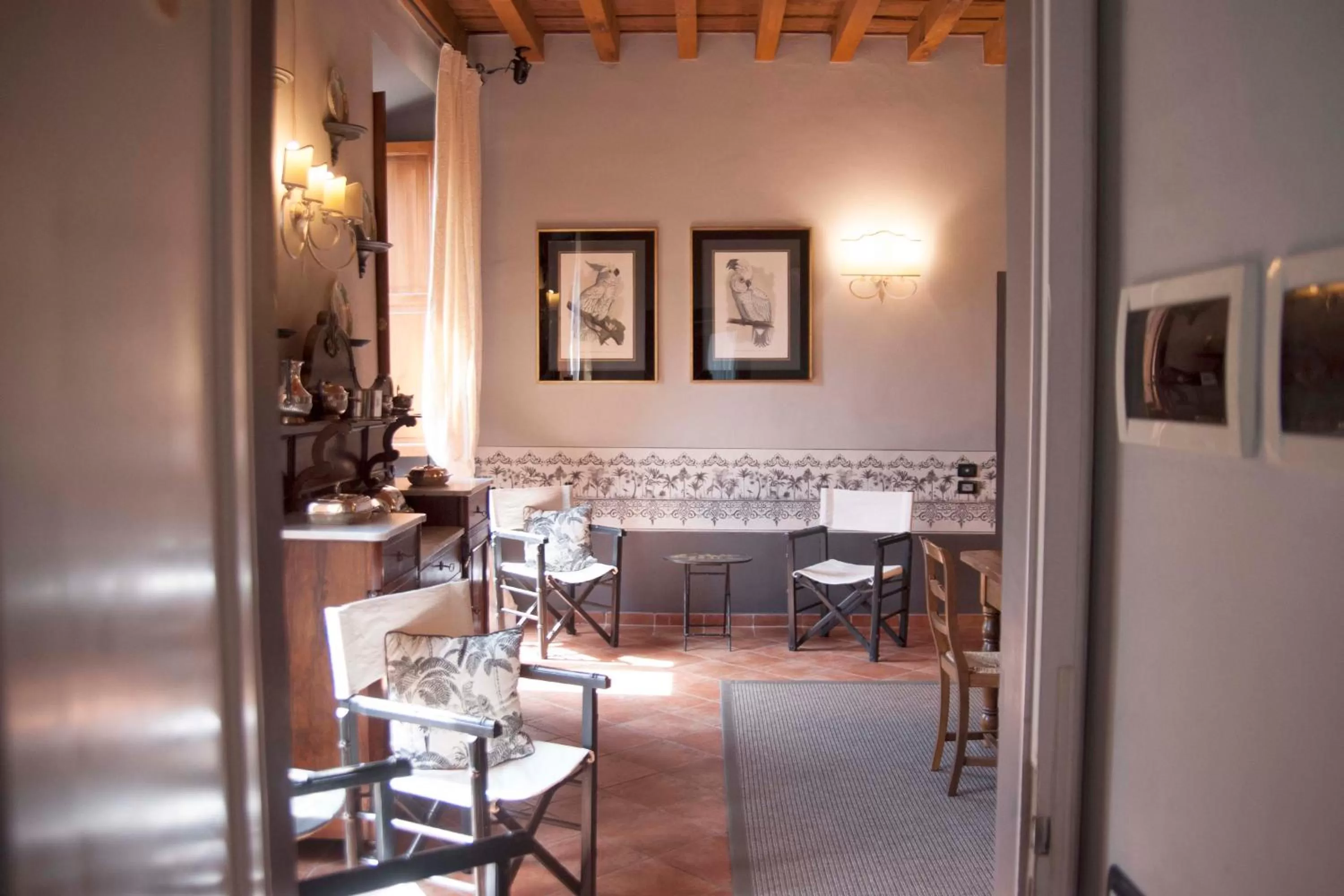 Communal lounge/ TV room in Antica Dimora De' Benci