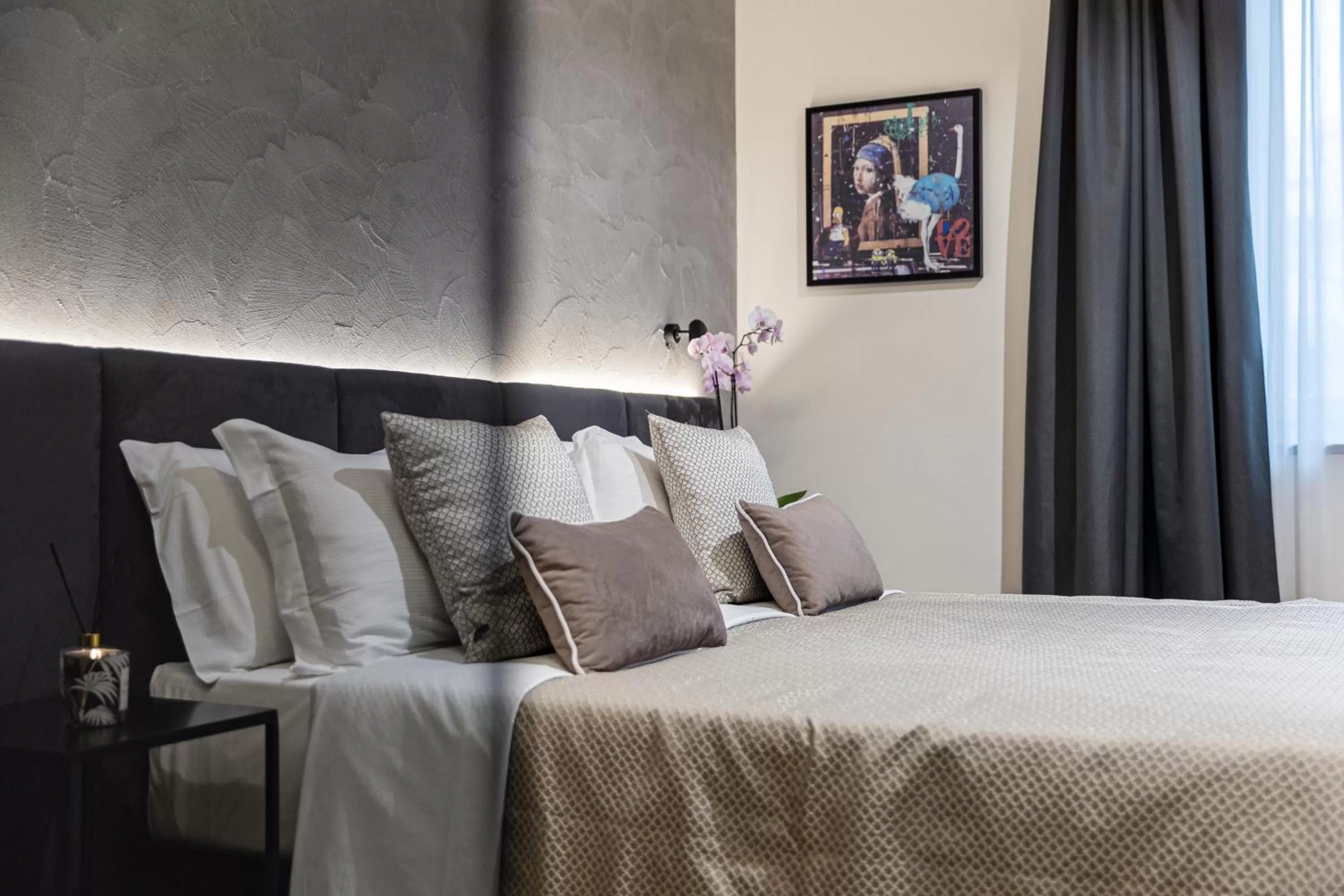 Bed in Corso 84 Luxury Suites