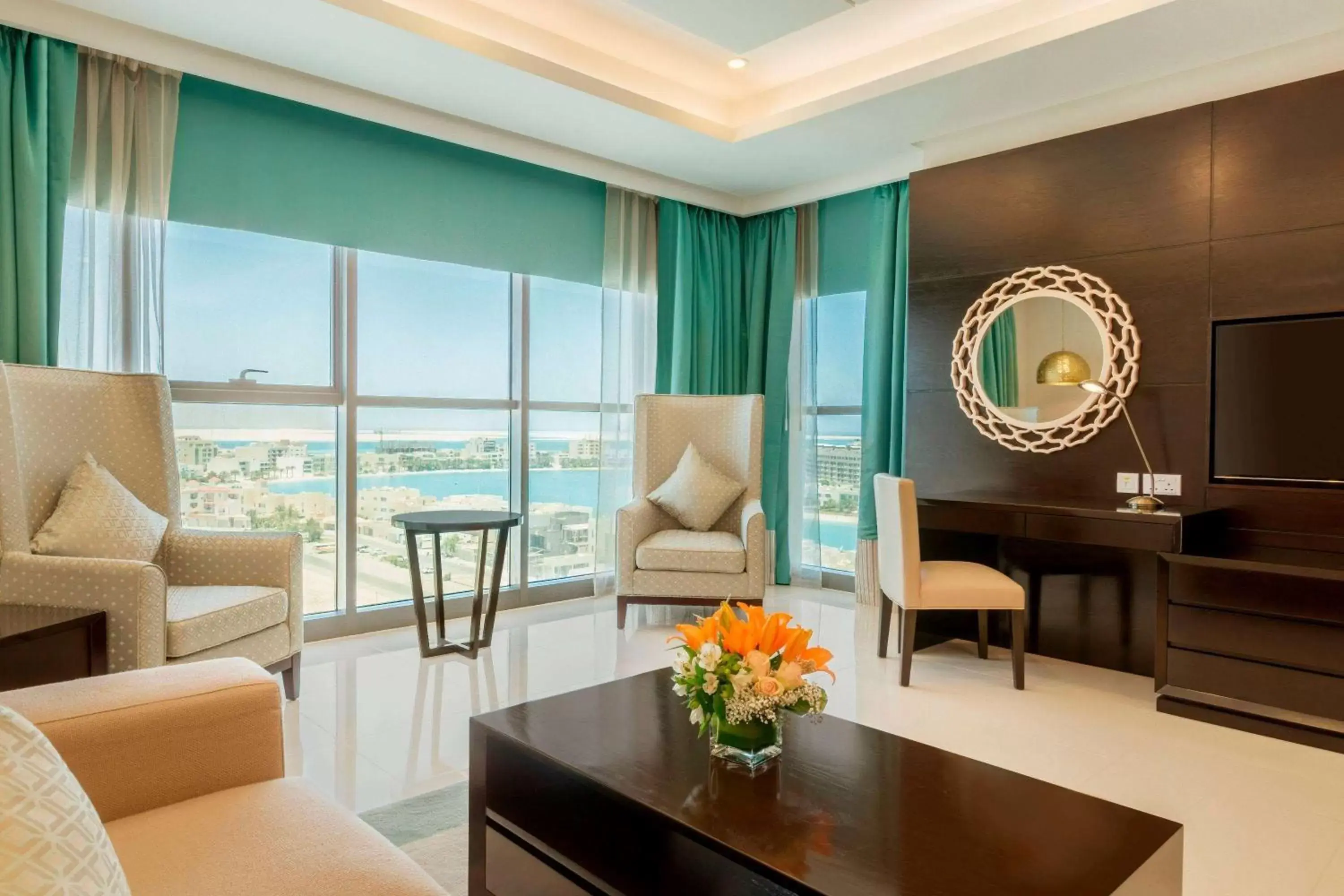 Photo of the whole room, Seating Area in Ramada Hotel and Suites Amwaj Islands