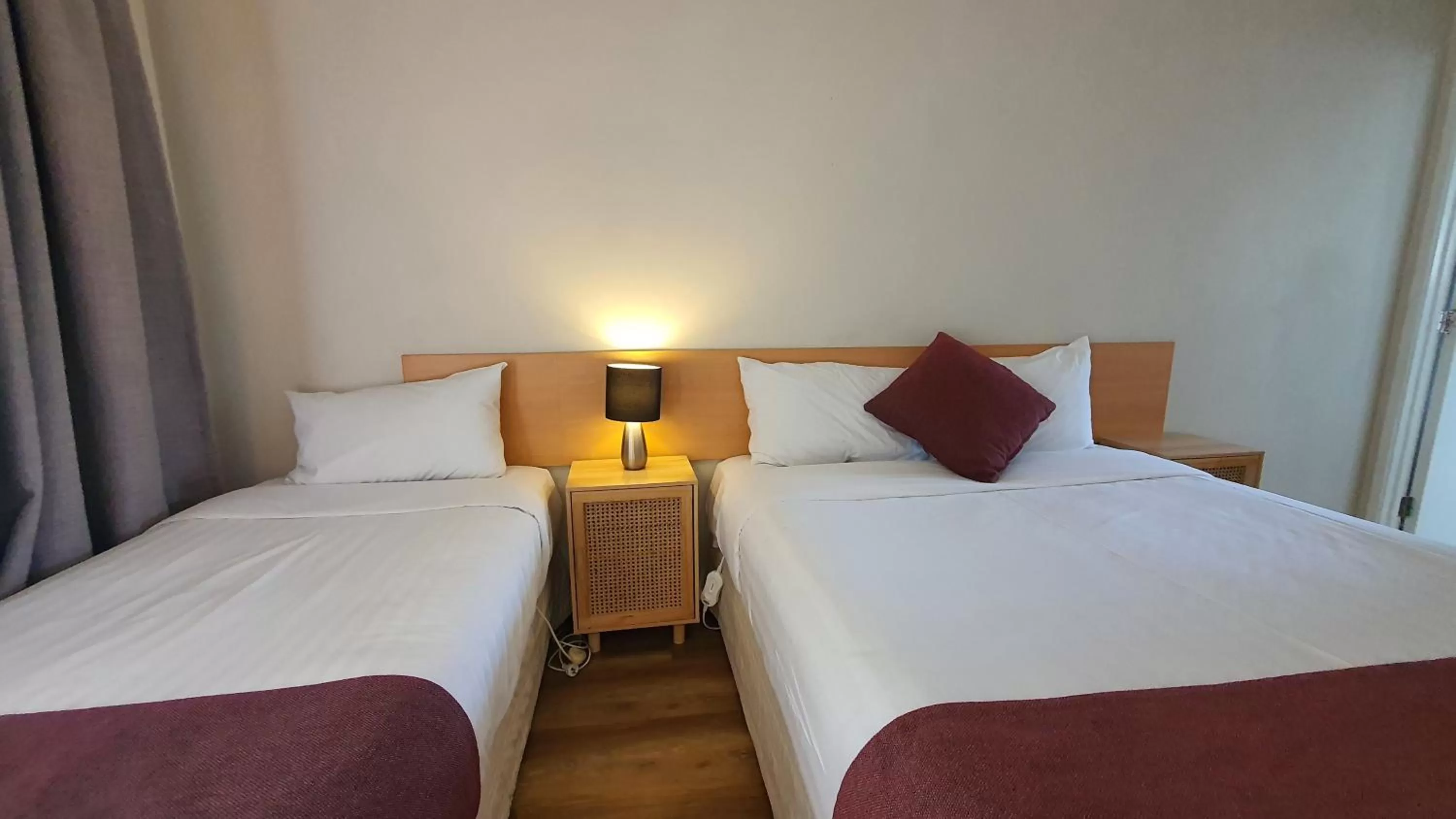 Bed in Ocean Inn Motel