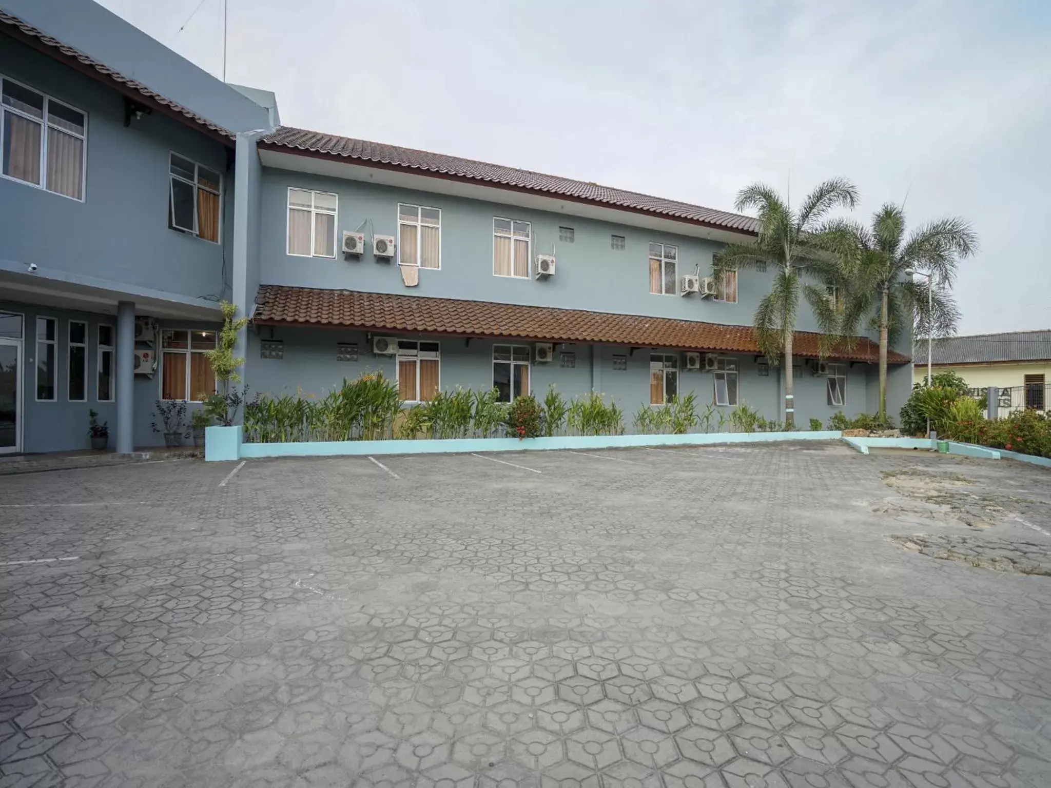 Property building in Super OYO 1844 Bravo Residence Property building in Super OYO 1844 Bravo Residence