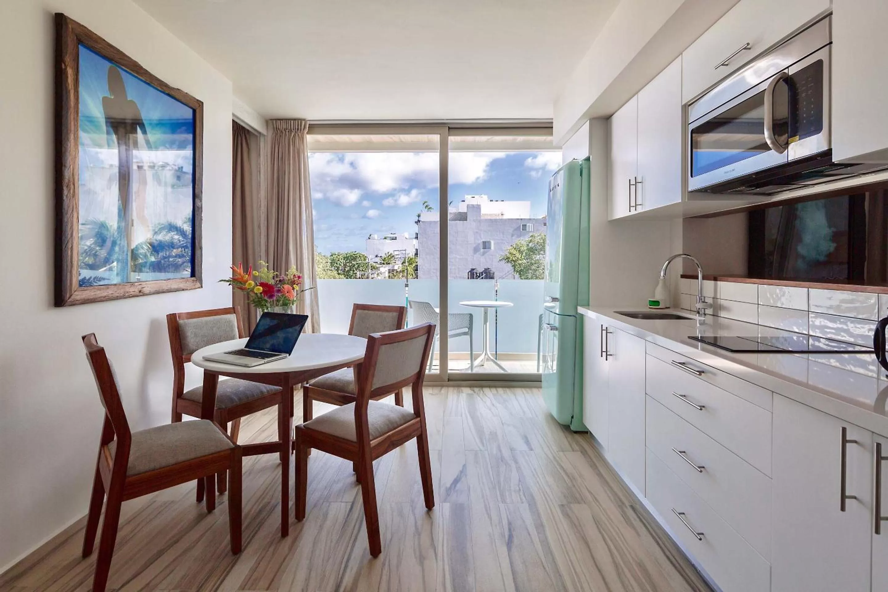 Kitchen or kitchenette in Newport House Playa Boutique Hotel