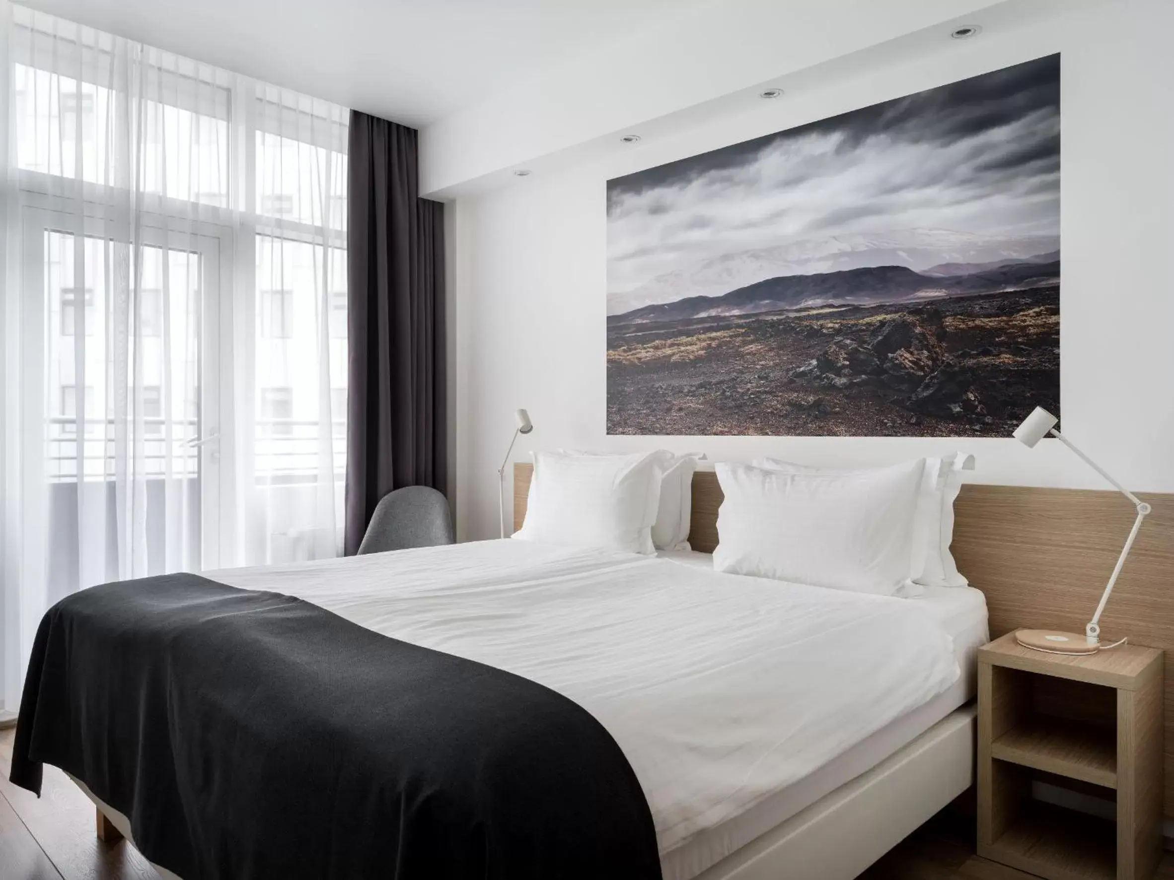 Bed in Storm Hotel by Keahotels