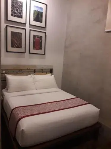 Bed in The Bricks Hotel