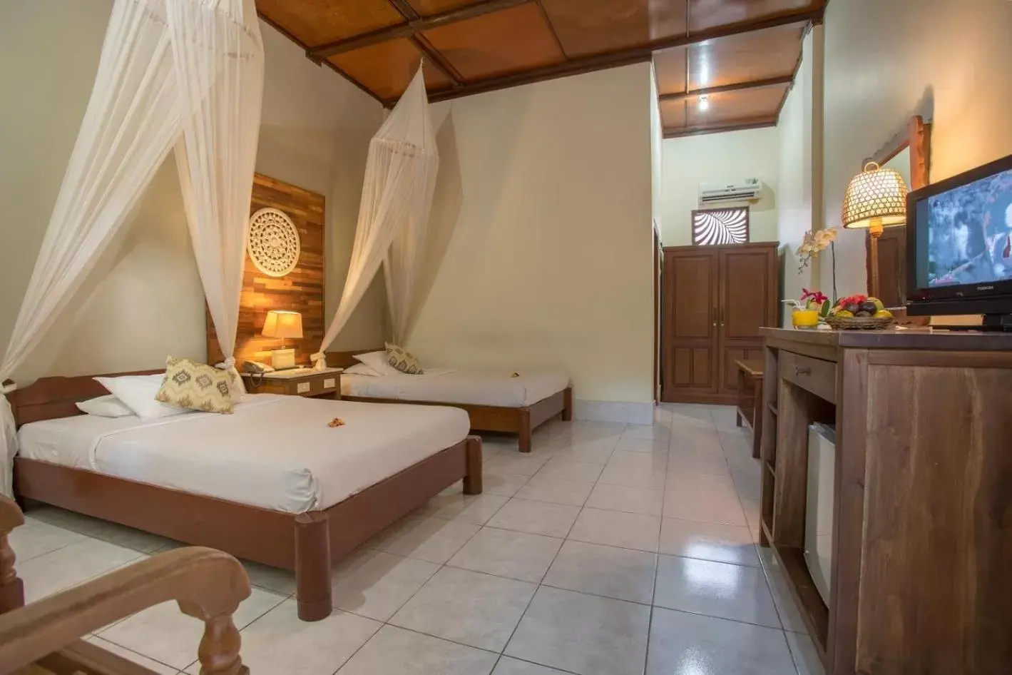 Garden view, Bed in Bumi Ayu Bungalow Sanur