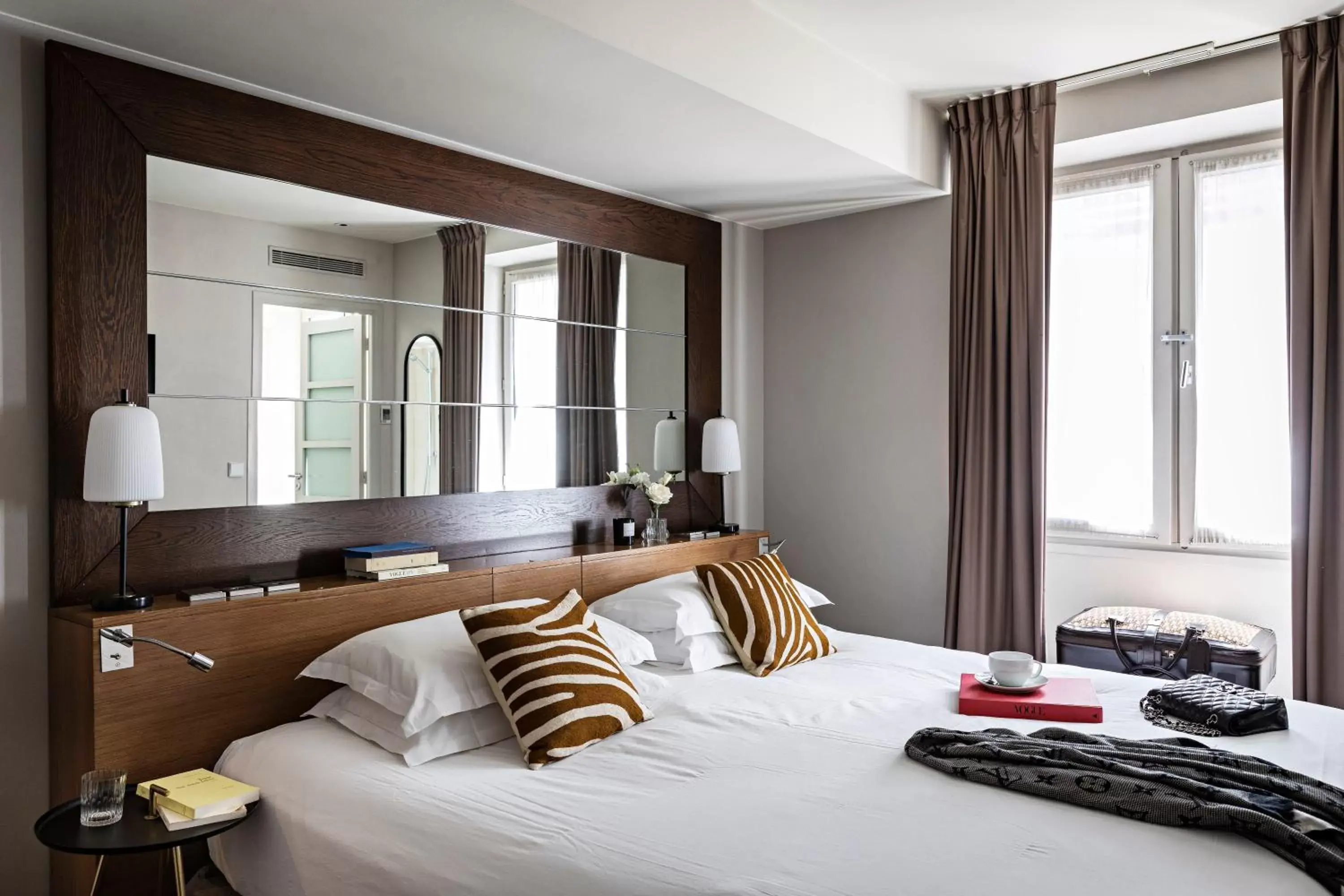 Bed in Holiday Inn Paris Elysées, an IHG Hotel