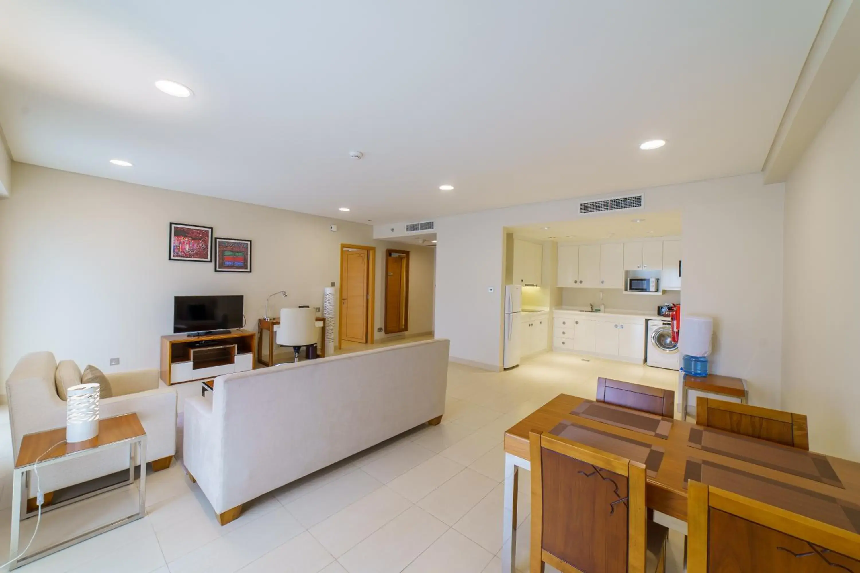 TV and multimedia, Seating Area in Levatio Suites Muscat, a member of Radisson Individuals