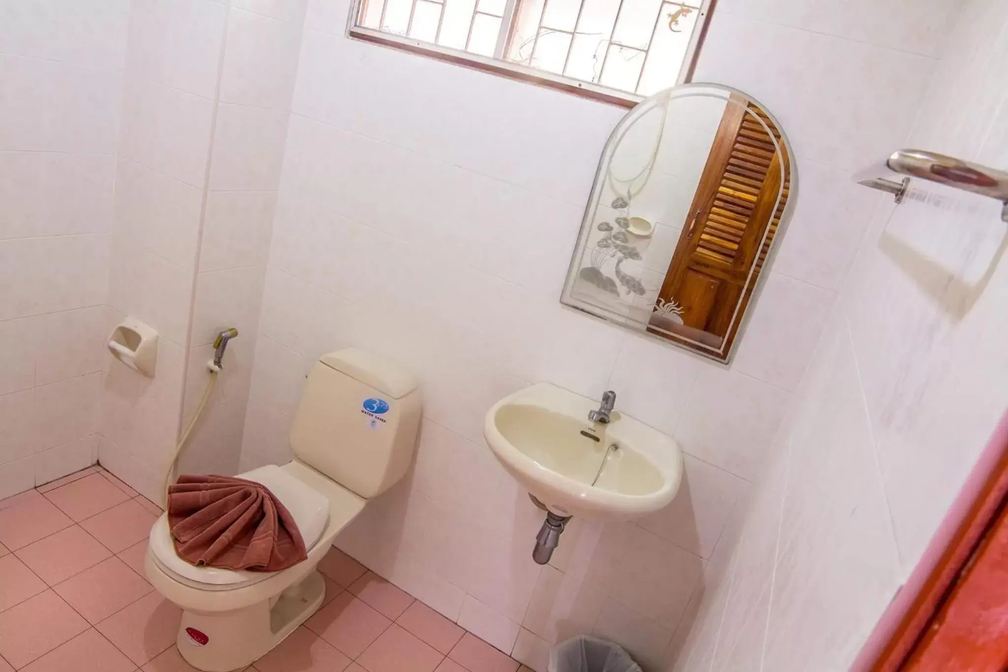 Photo of the whole room, Bathroom in Pongphen Guesthouse - SHA Plus Certified