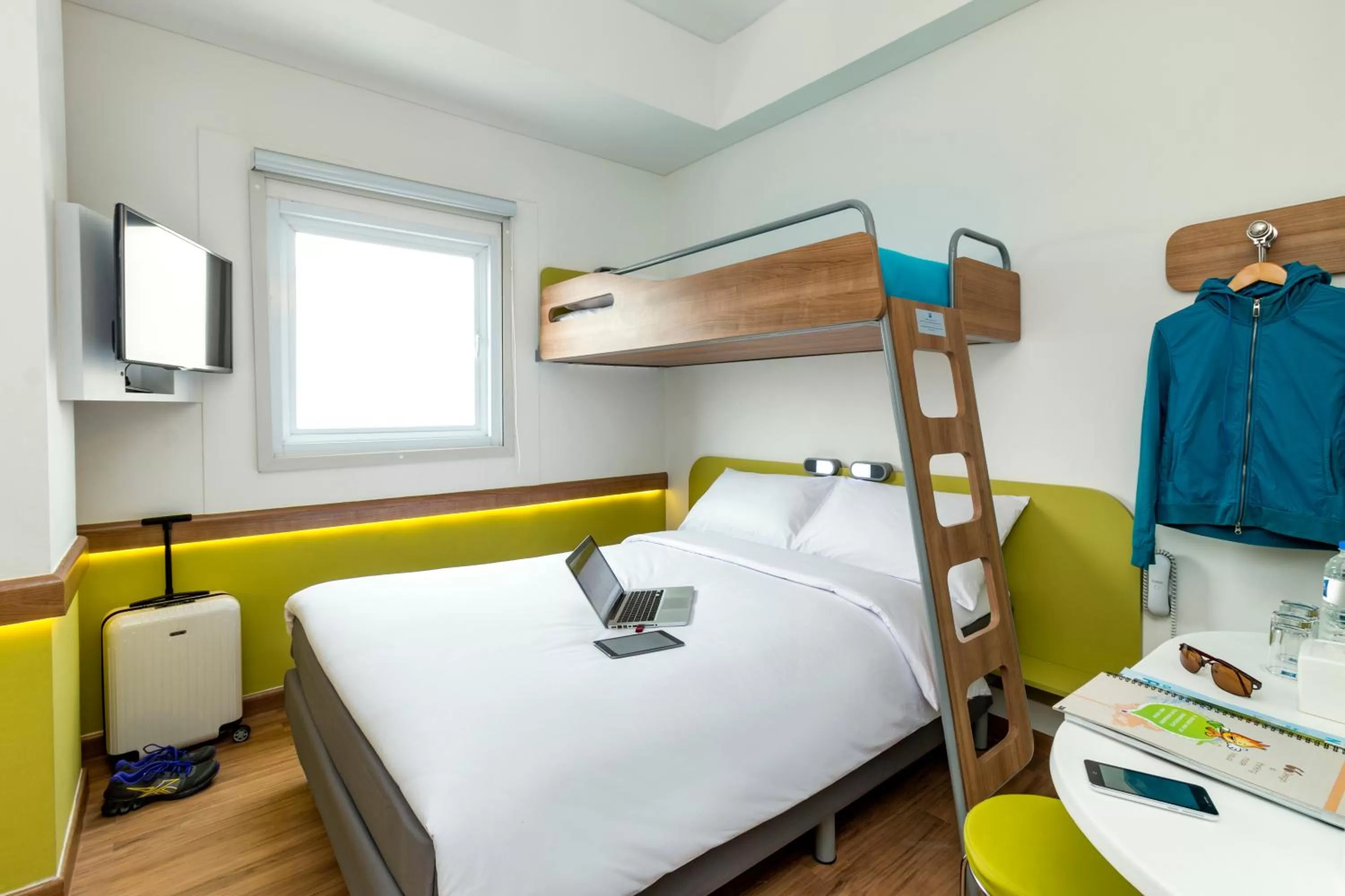 Photo of the whole room, Bed in Deka Hotel Surabaya HR Muhammad