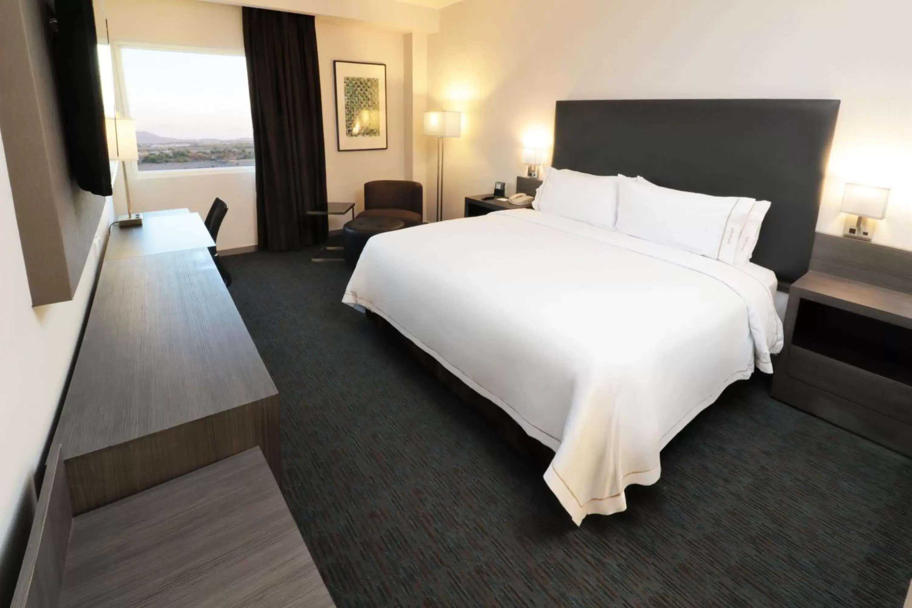 Bed in Holiday Inn Express Hotel & Suites Hermosillo, an IHG Hotel