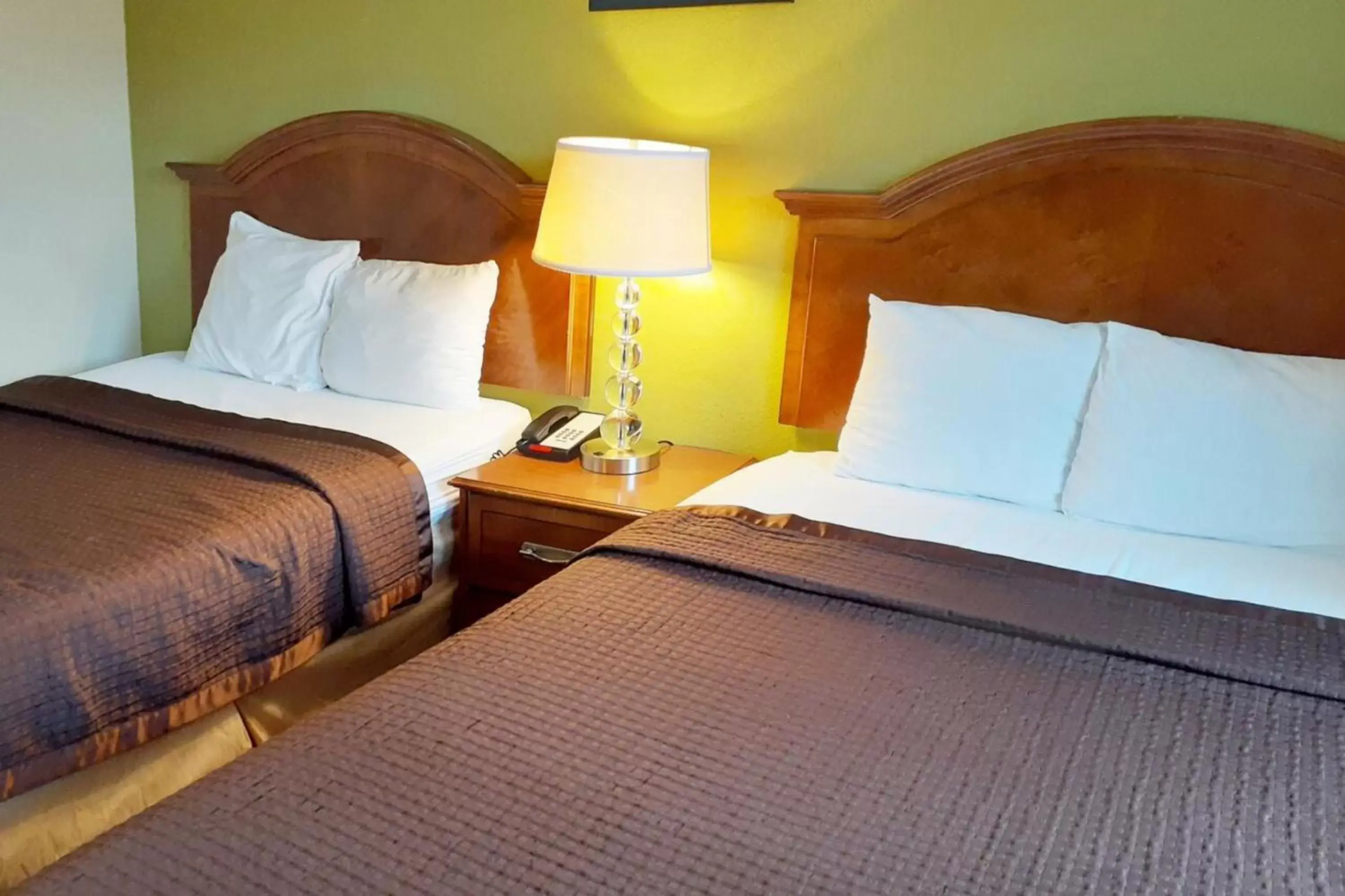 Bed in Savannah Garden Hotel Bed in Savannah Garden Hotel