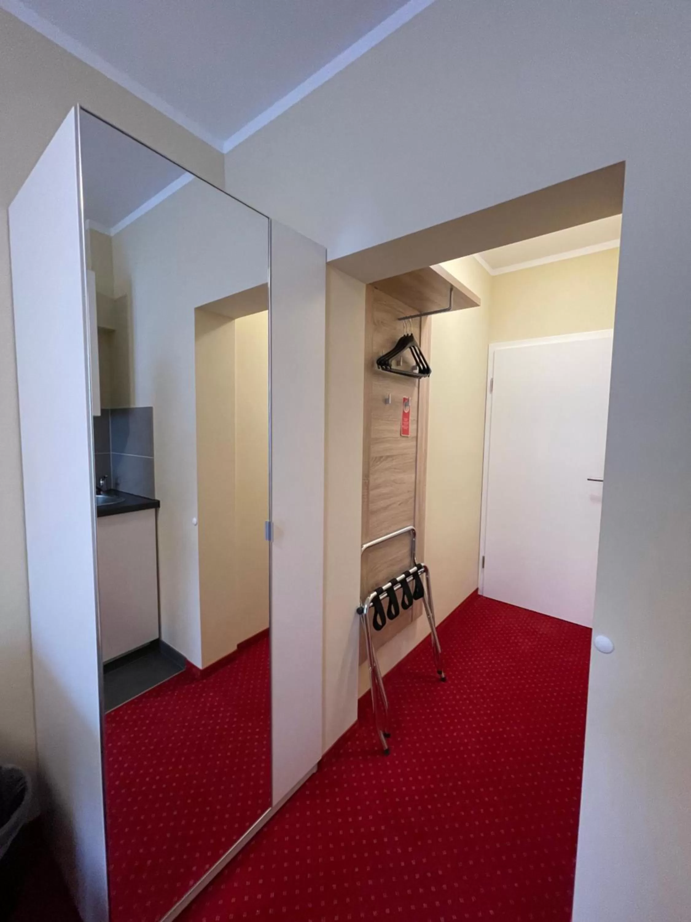 wardrobe in Palm Premium Hotel & Apartments