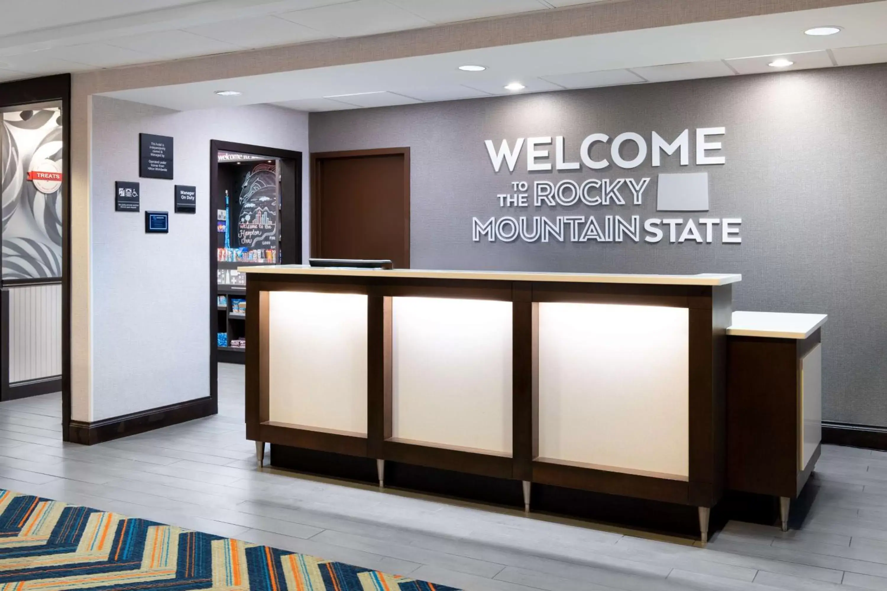 Lobby or reception in Hampton Inn Denver-International Airport Lobby or reception in Hampton Inn Denver-International Airport