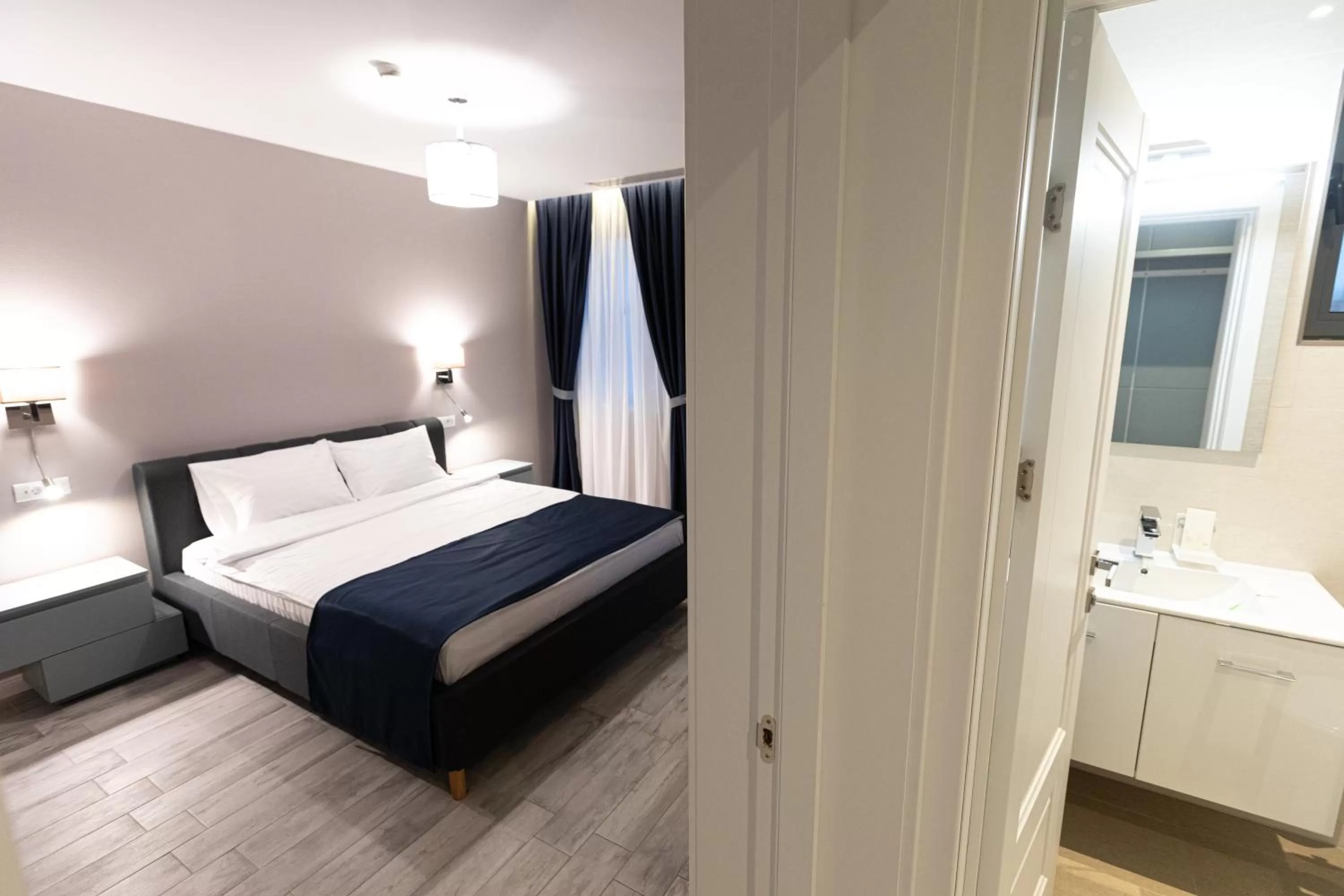 Bedroom, Bed in Omnia Apartments