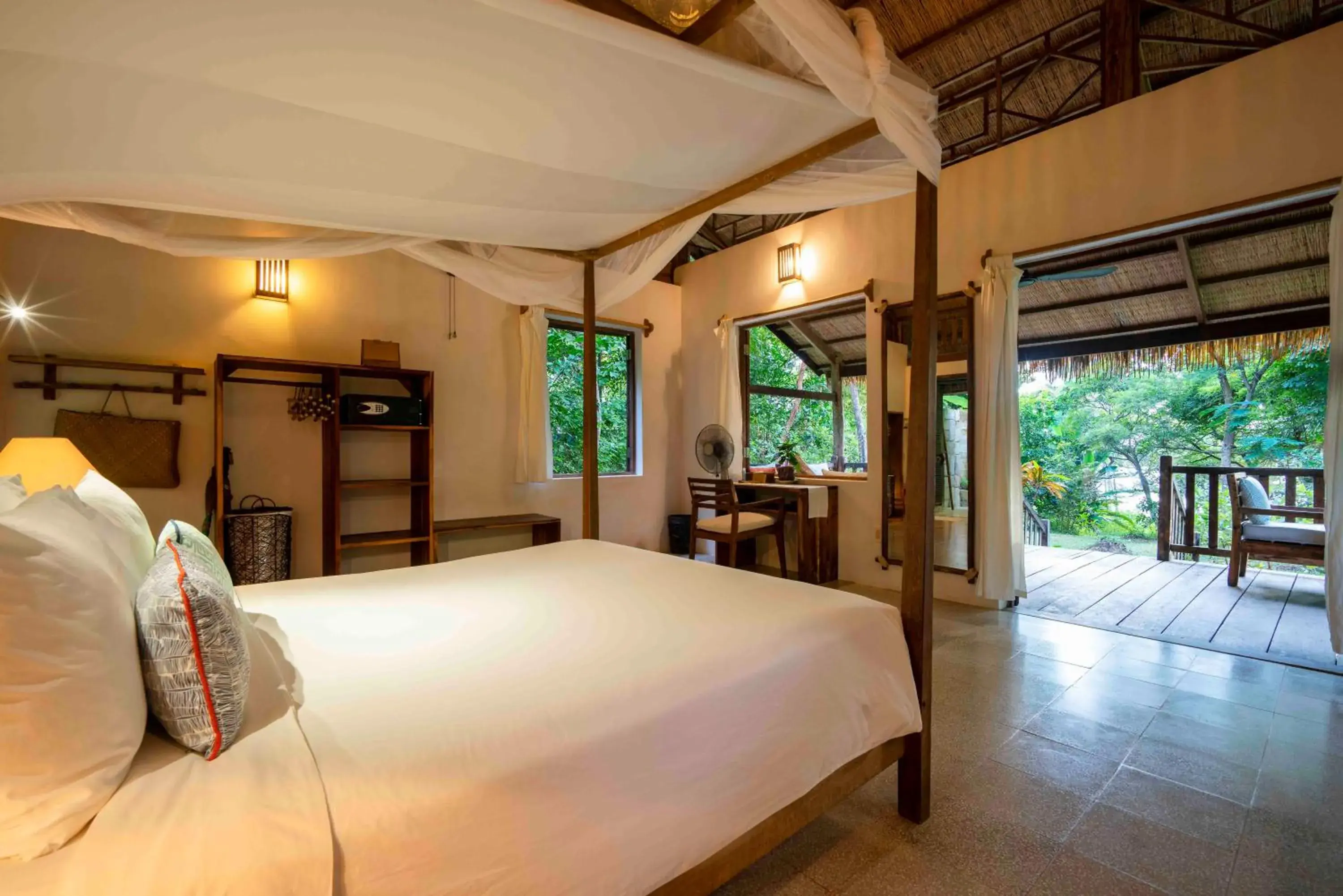 Bed in Mango Bay Resort Bed in Mango Bay Resort