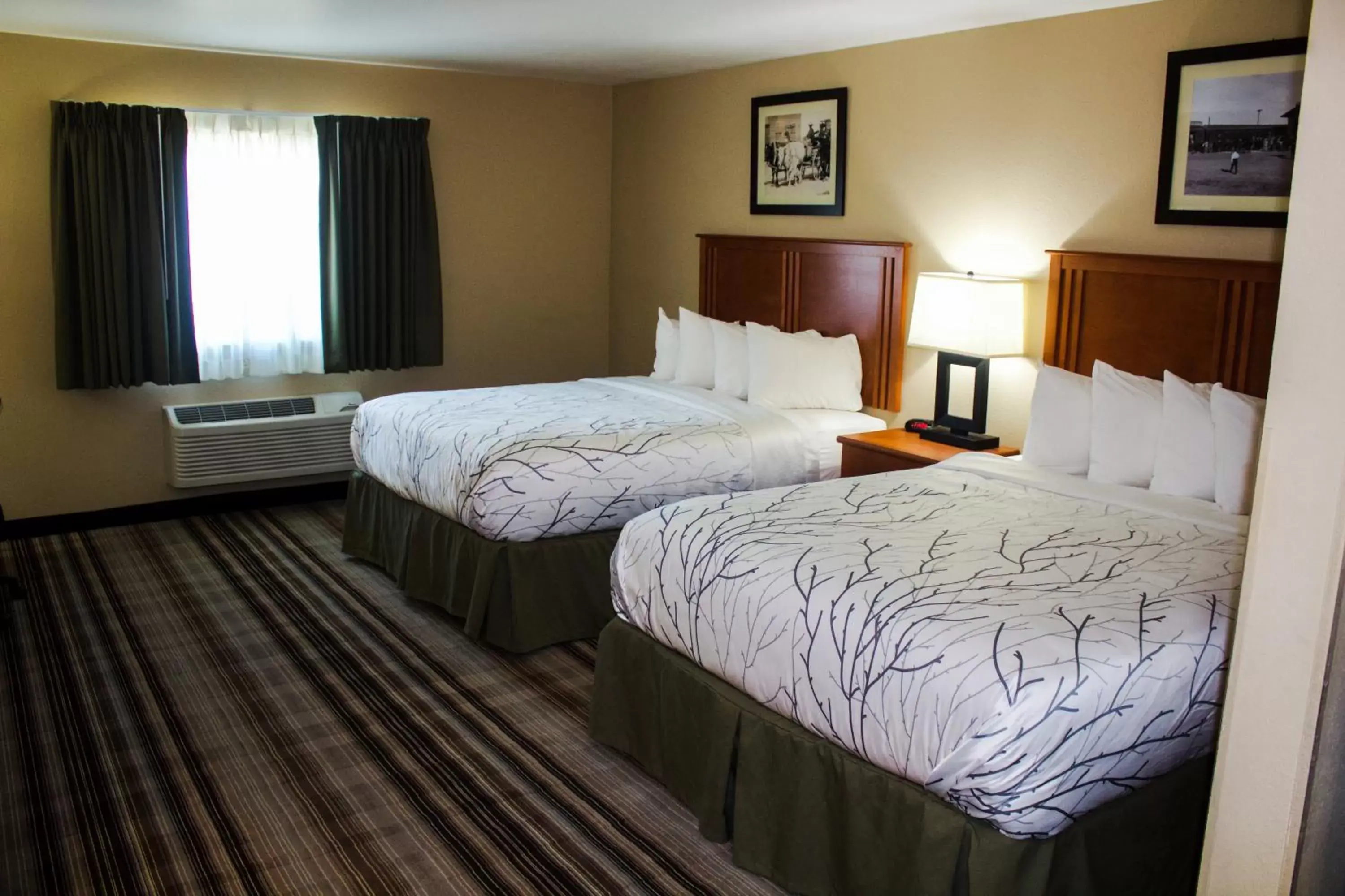 Bed in Bowman Lodge & Convention Center