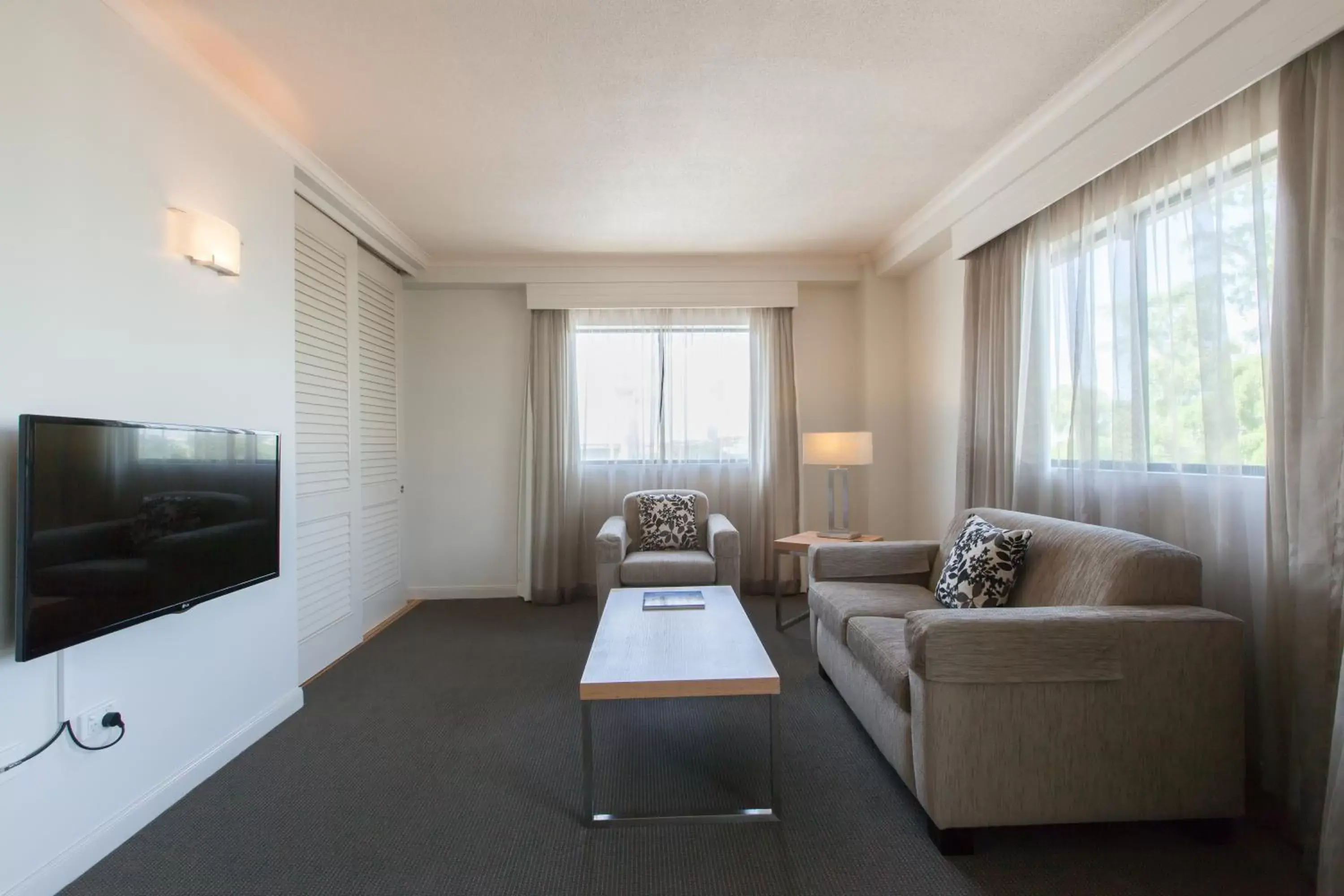 Living room, Seating Area in Central Cosmo Apartment Hotel