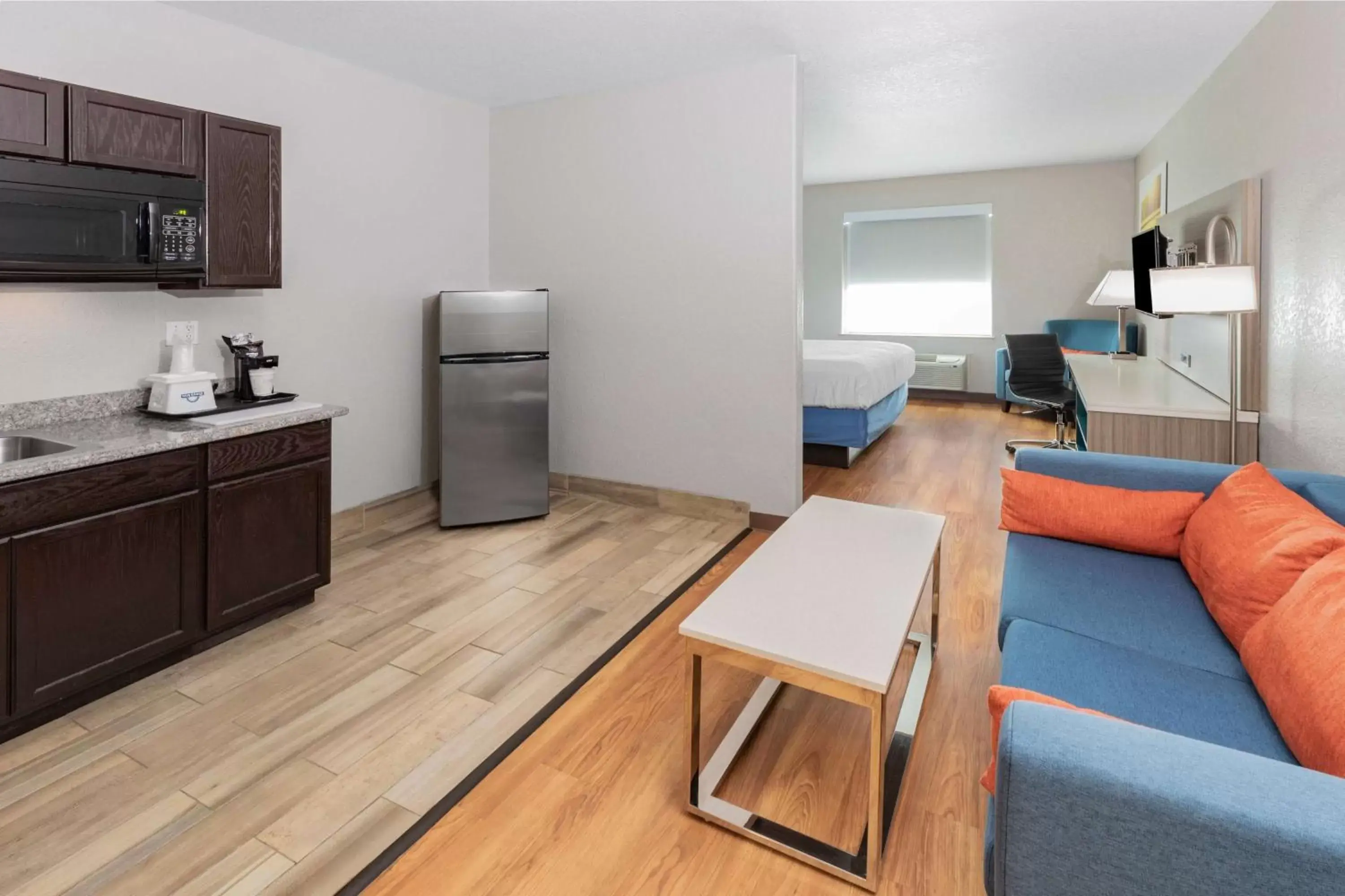 Photo of the whole room, Kitchen/Kitchenette in Days Inn & Suites by Wyndham San Antonio near AT&T Center