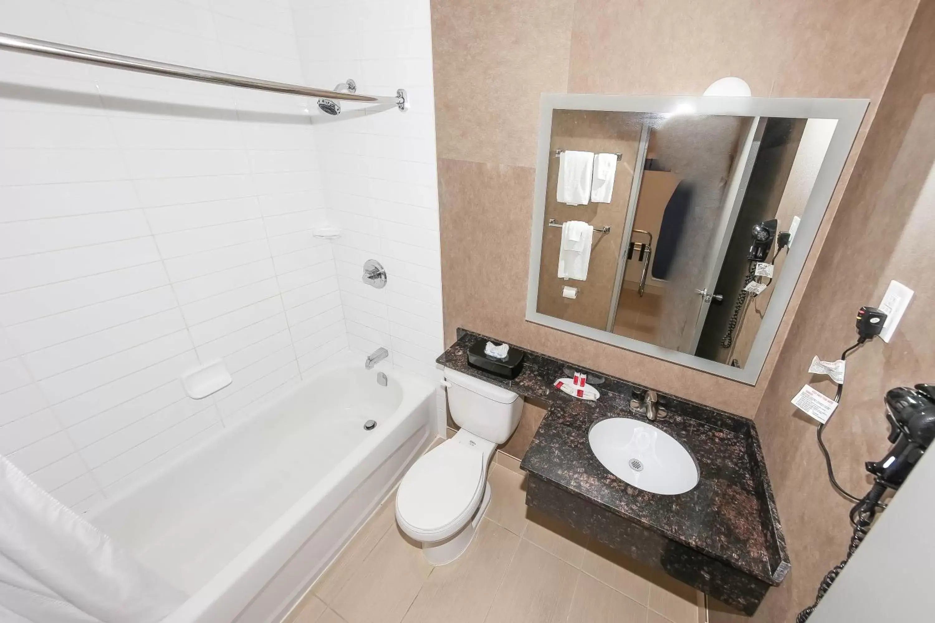 Bathroom in Howard Johnson by Wyndham Winnipeg West