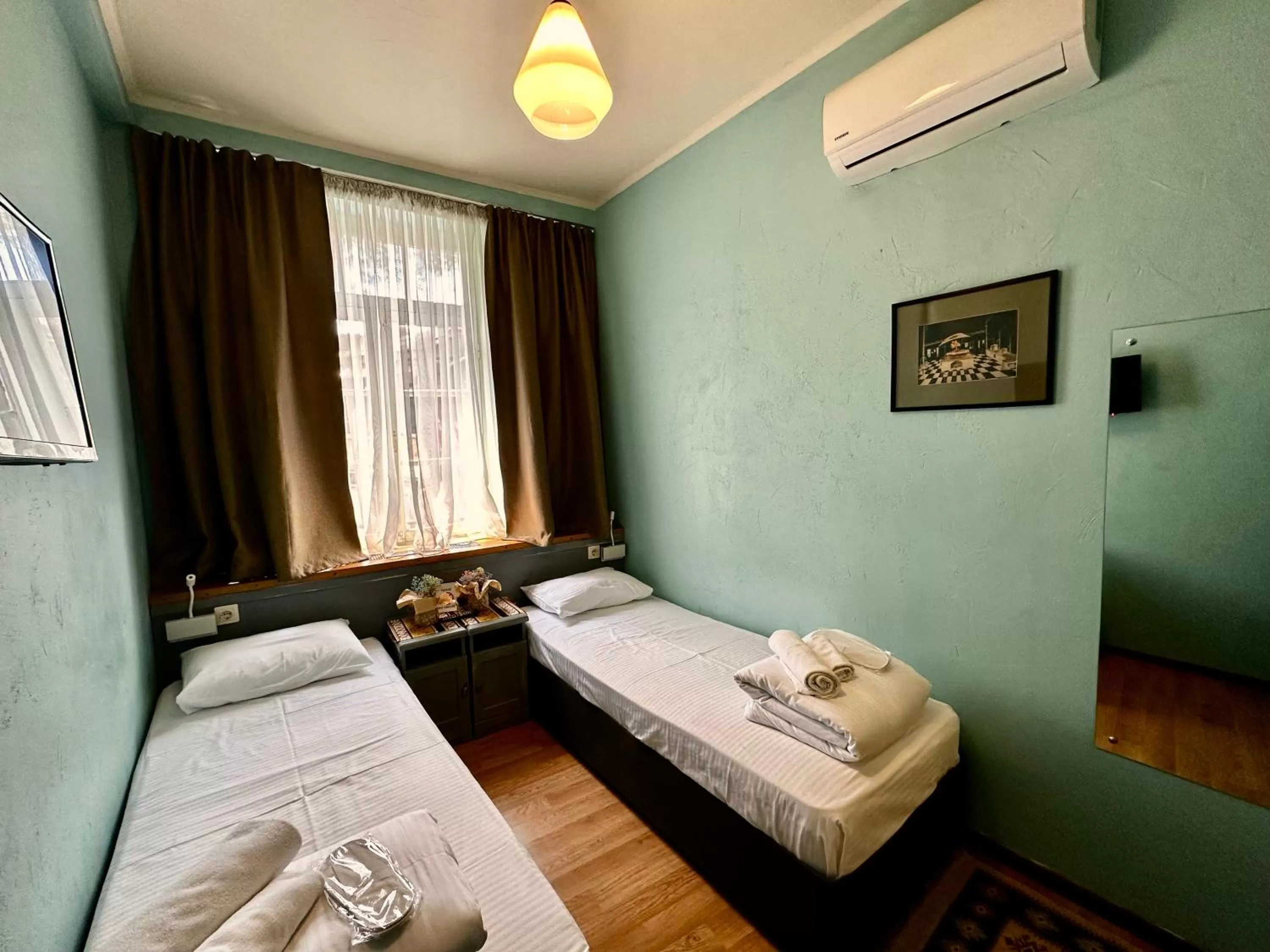 Bed in Kindli Boutique Hotel