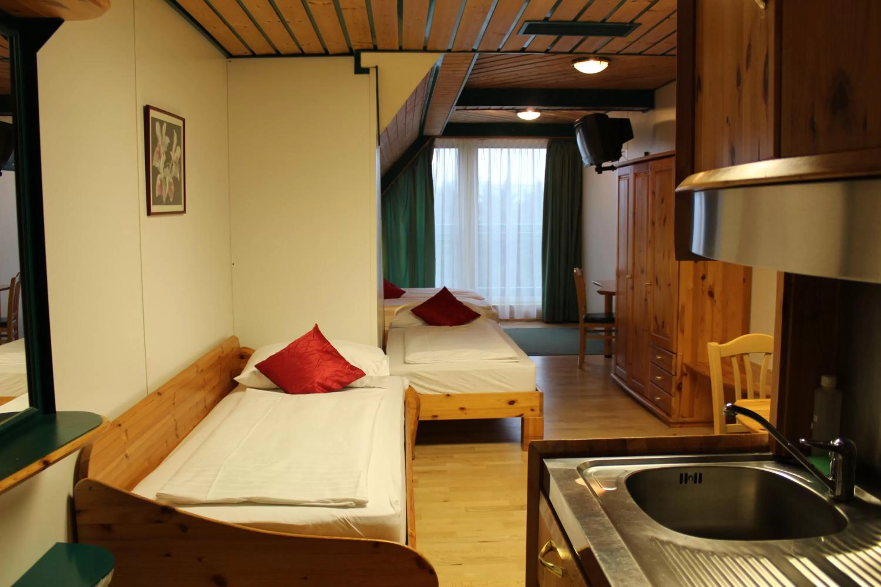 Photo of the whole room, Bed in Hotel Asperner Löwe