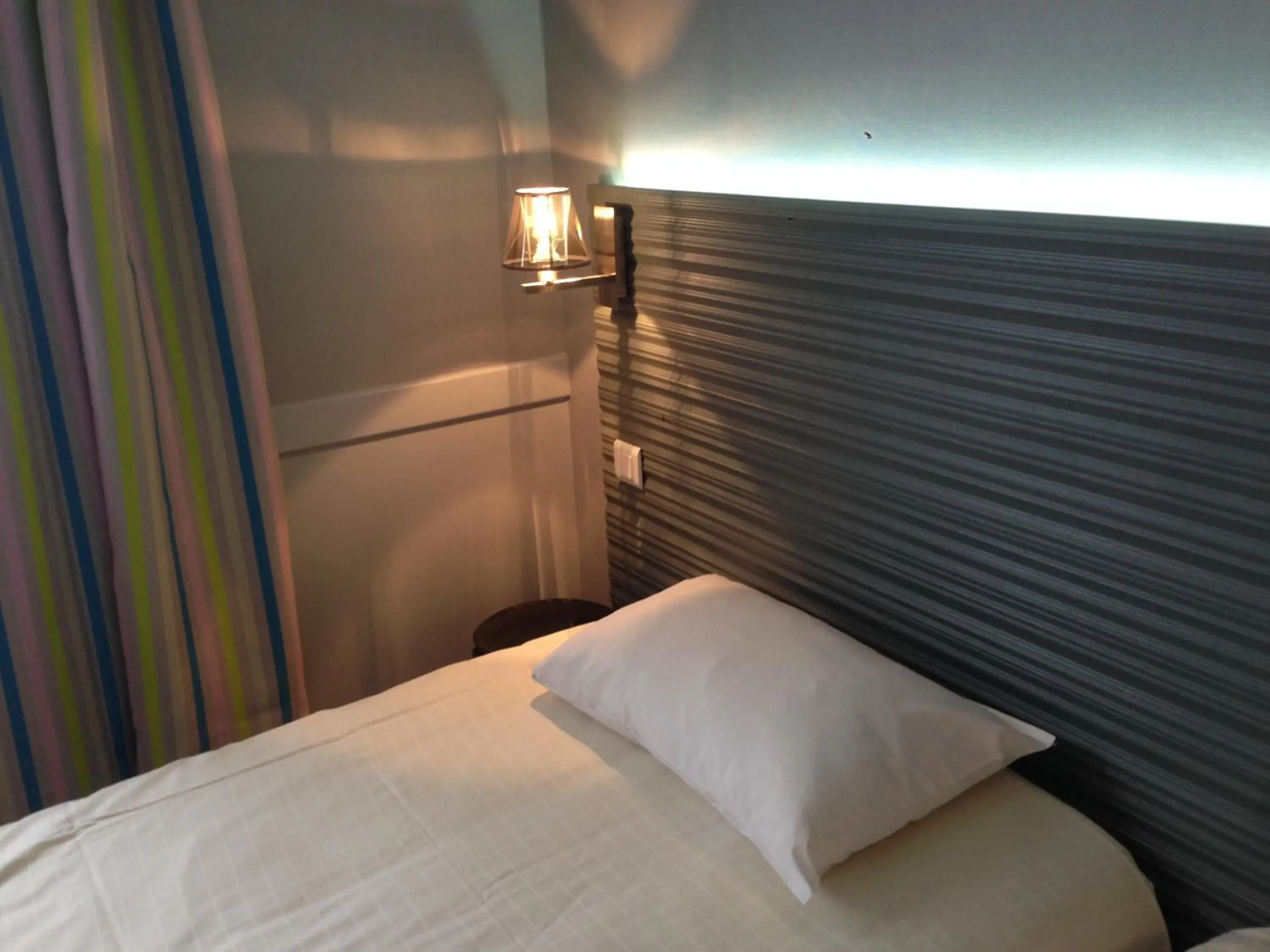 Bed in LE M HOTEL & SPA HONFLEUR