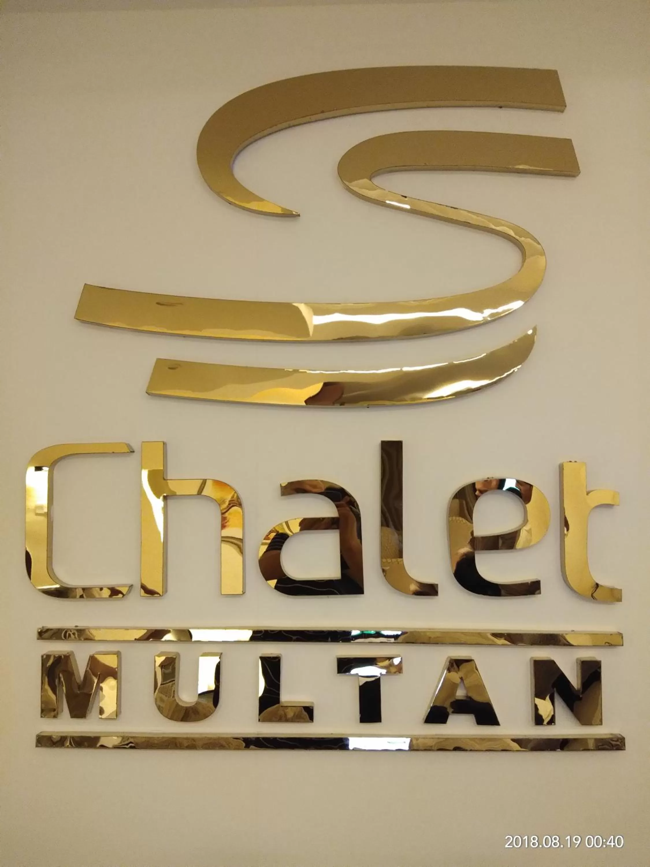 Property logo or sign in S Chalet Multan