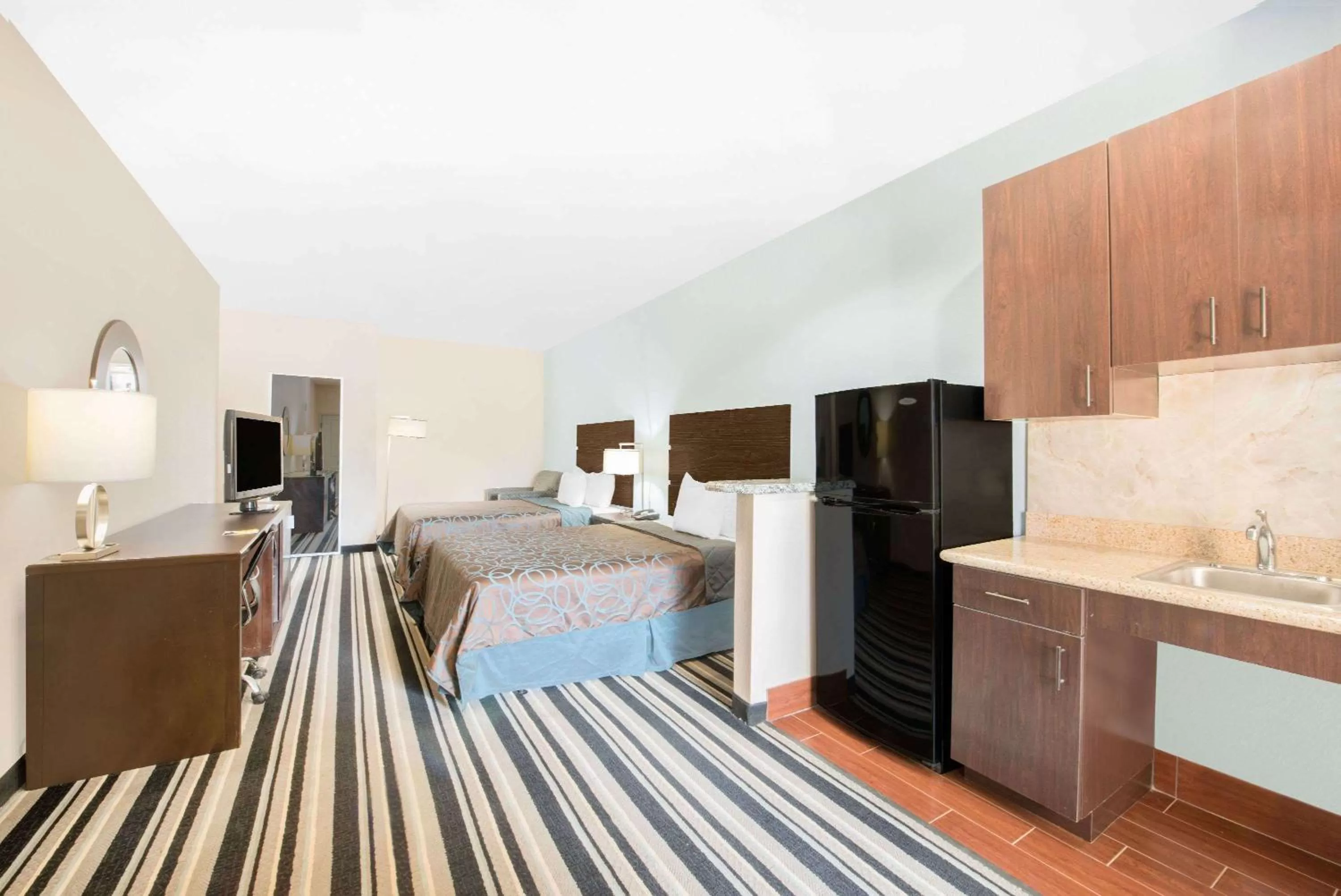 Photo of the whole room, Bed in Super 8 by Wyndham Dilley TX