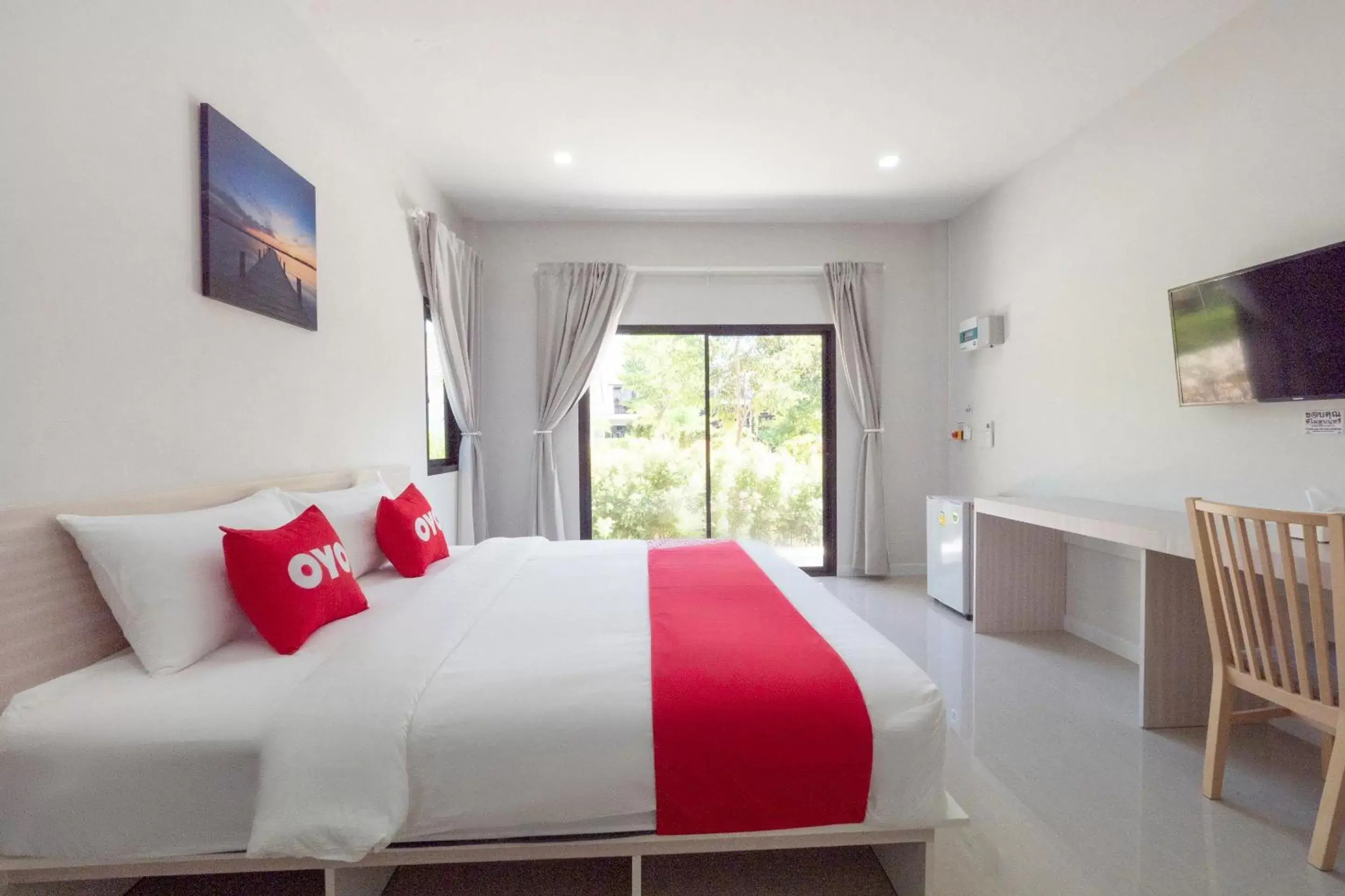 Bedroom in Capital O 75378 Thawapee Resort