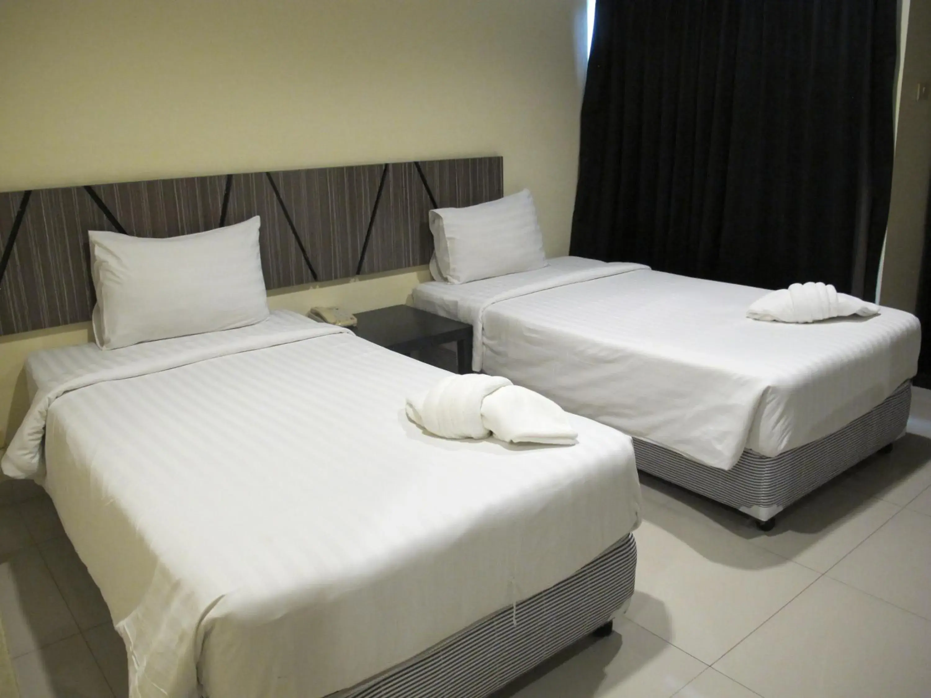 Bed in AIRY Suvarnabhumi Hotel