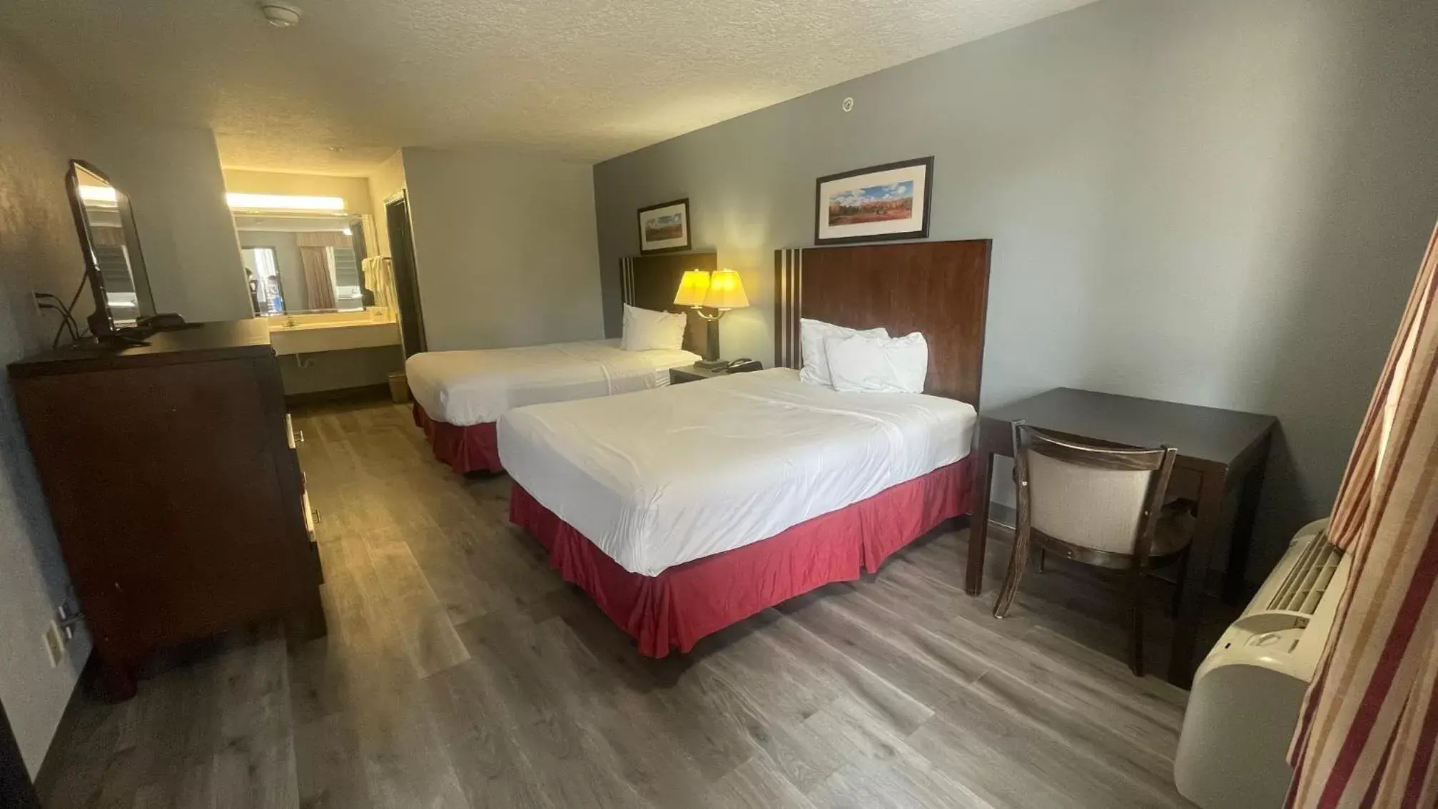 Bedroom, Bed in Days Inn & Suites by Wyndham Winnie