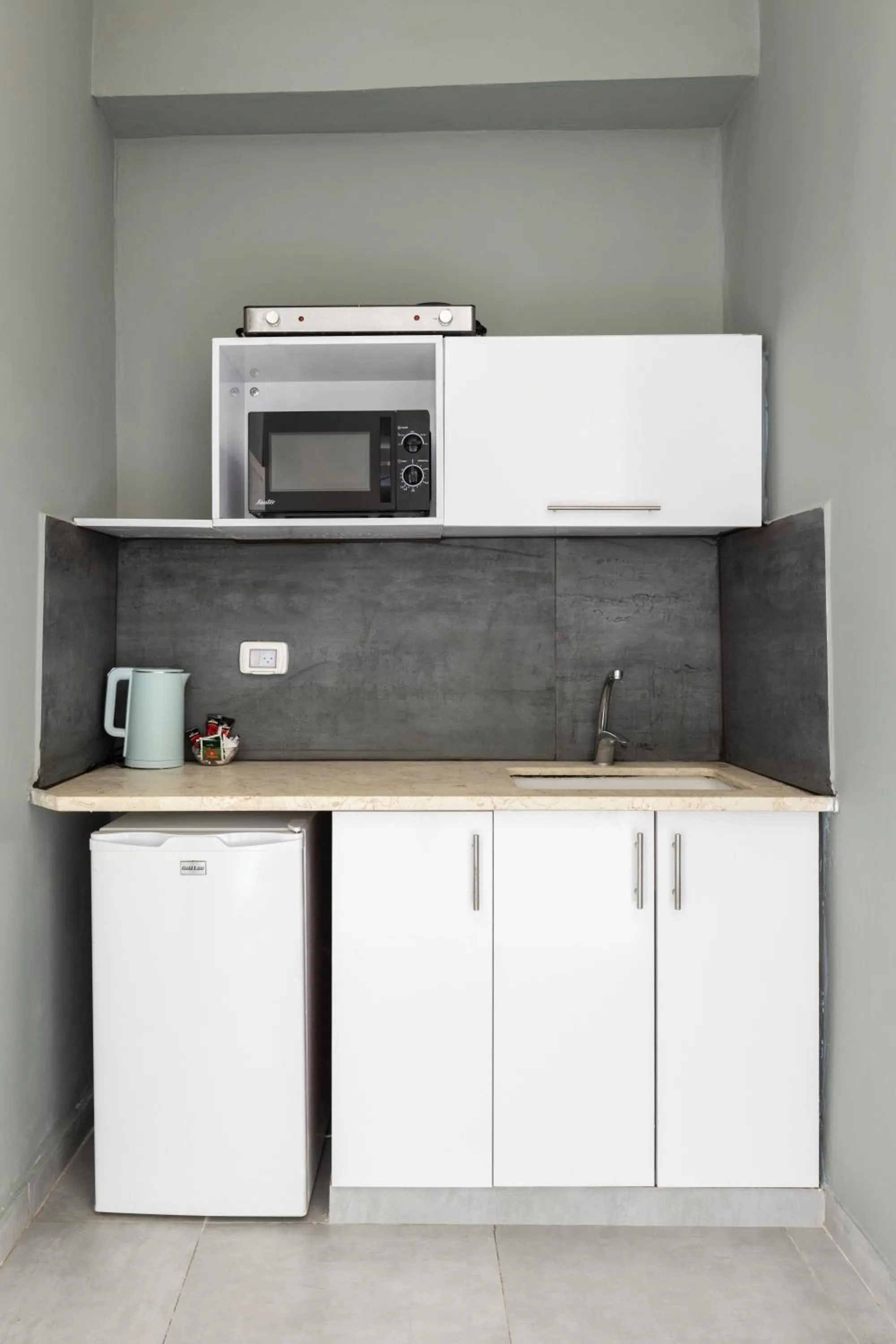 Kitchen or kitchenette in Liber Tel Aviv Sea Shore Suites BY RAPHAEL HOTELS