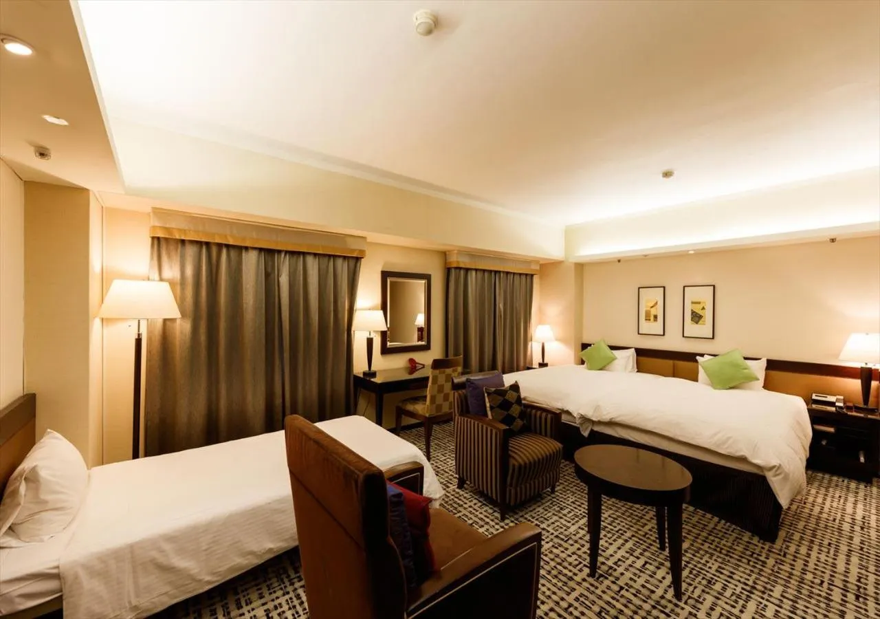 Bed in Kanazawa New Grand Hotel Prestige