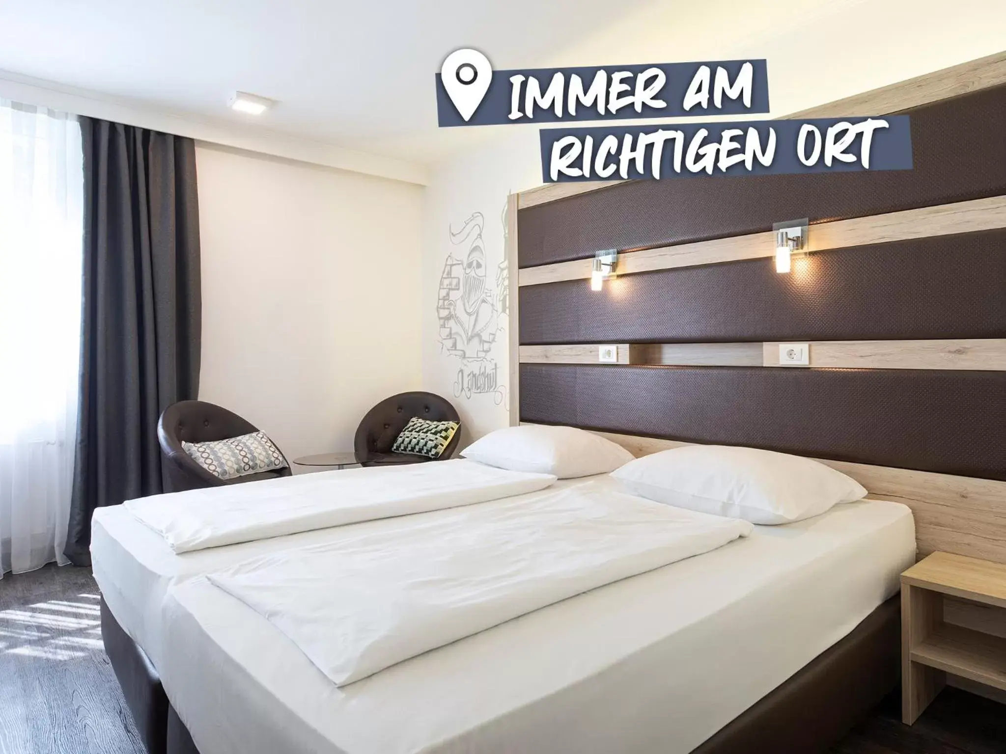 Photo of the whole room, Bed in ACHAT Hotel Kaiserhof Landshut