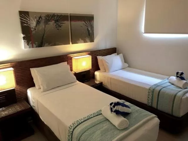 Bed in Port Douglas Private Apartments in Temple