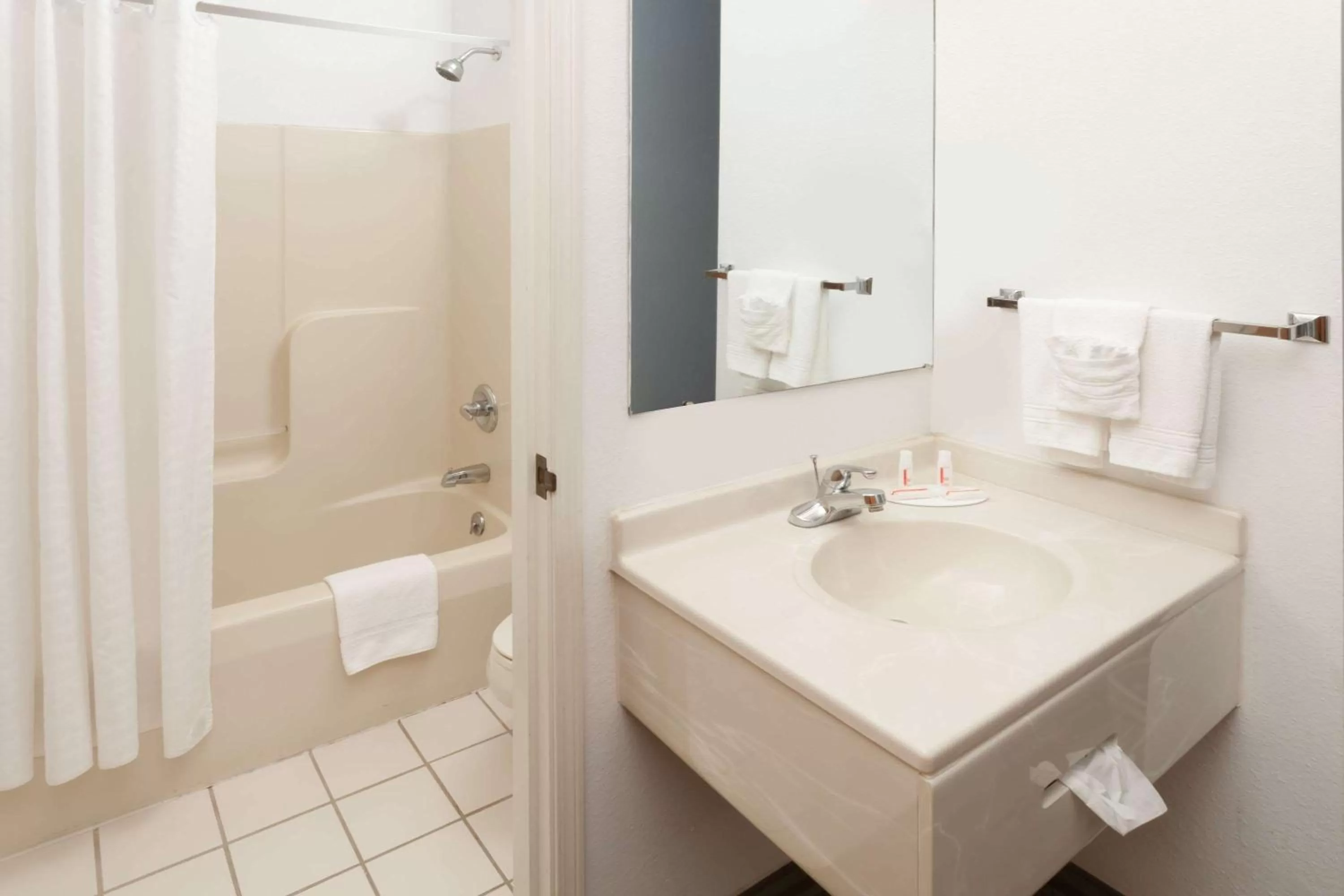 Bathroom in Super 8 by Wyndham Huntington