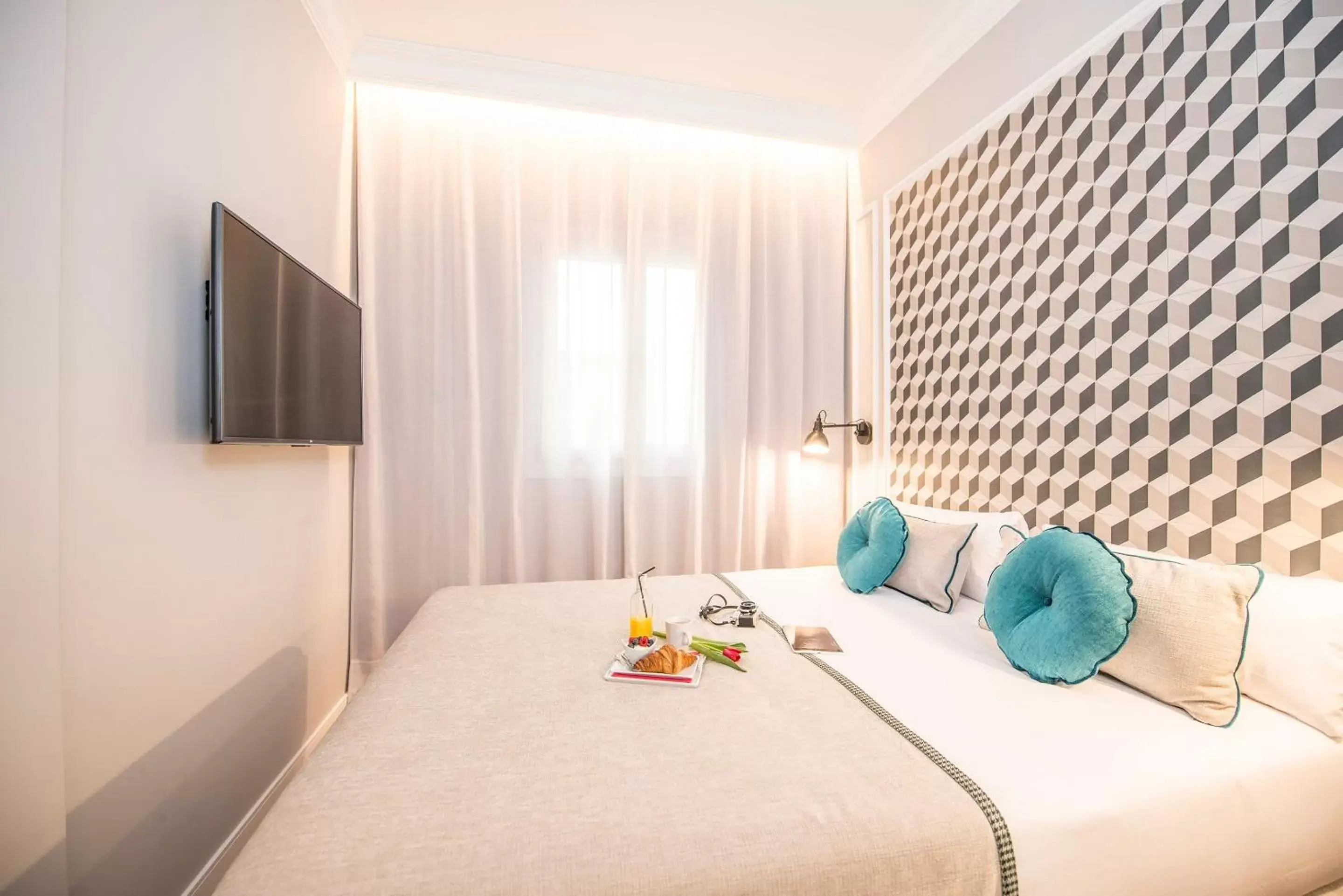 Bed in Mosaic Barcelona by Ona