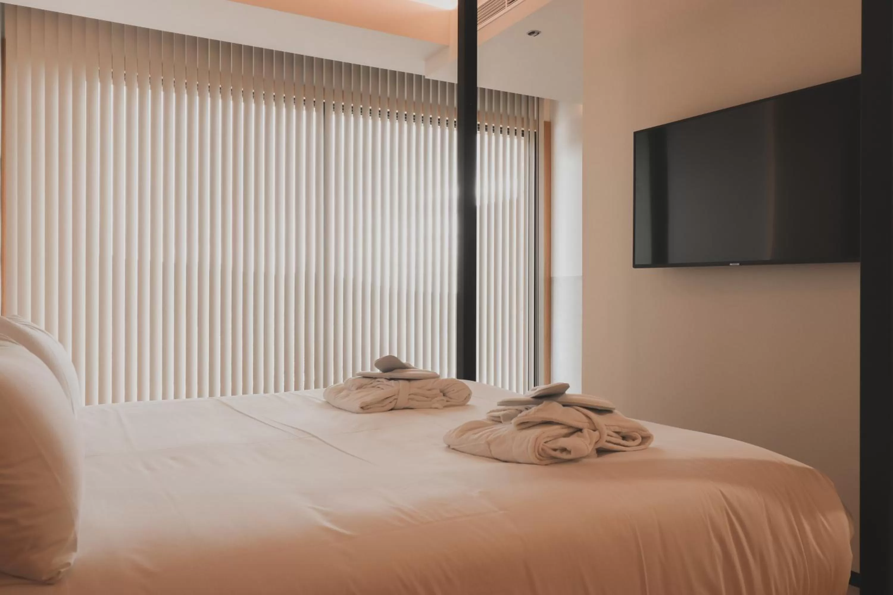 TV and multimedia, Bed in Atmos Hotel Boutique