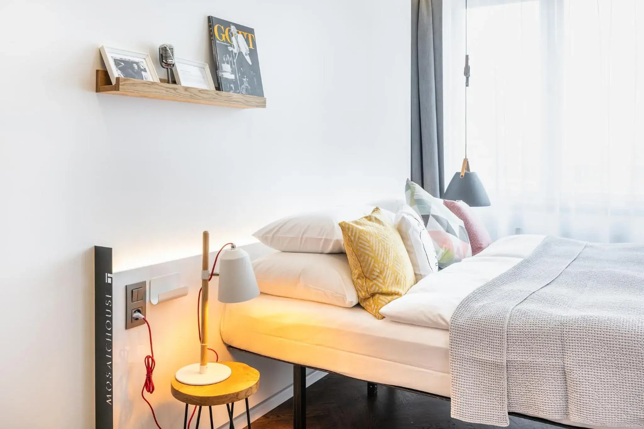 Bed, Seating Area in MOSAIC HOUSE Design Hotel