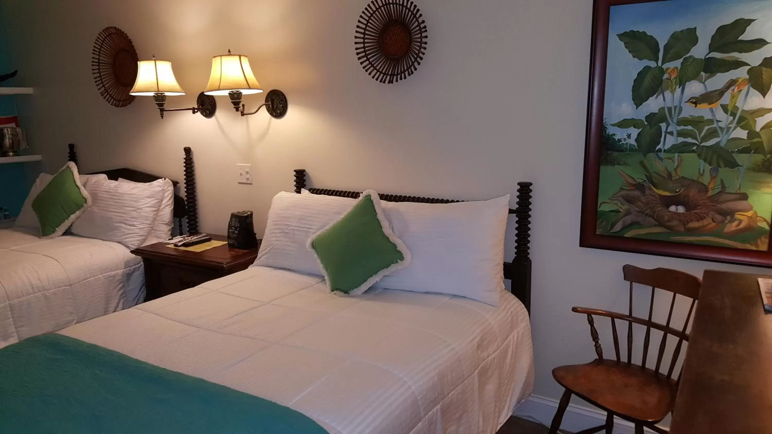 Photo of the whole room, Bed in The Caribbean Court Boutique Hotel