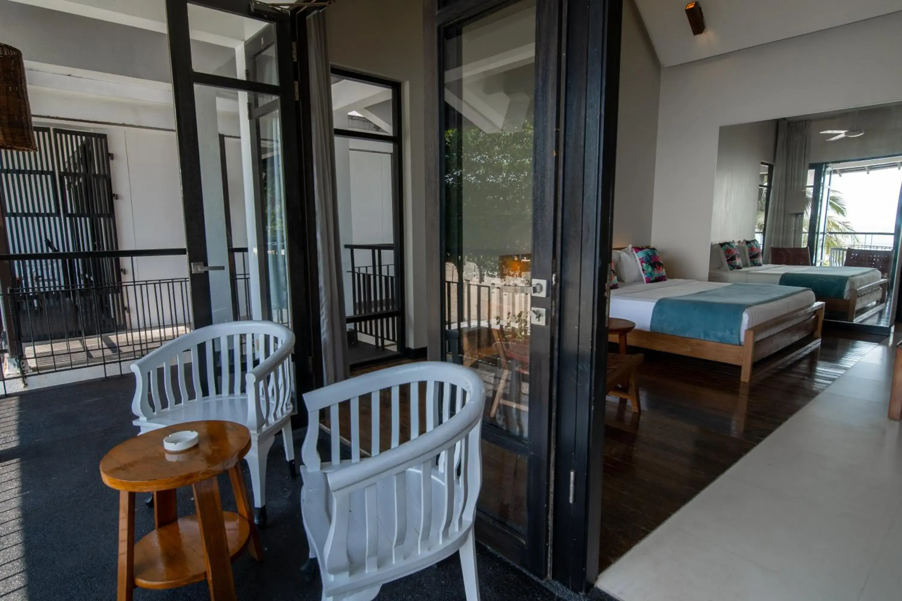 Seating area, Bed in Turi Beach Resort Seating area, Bed in Turi Beach Resort